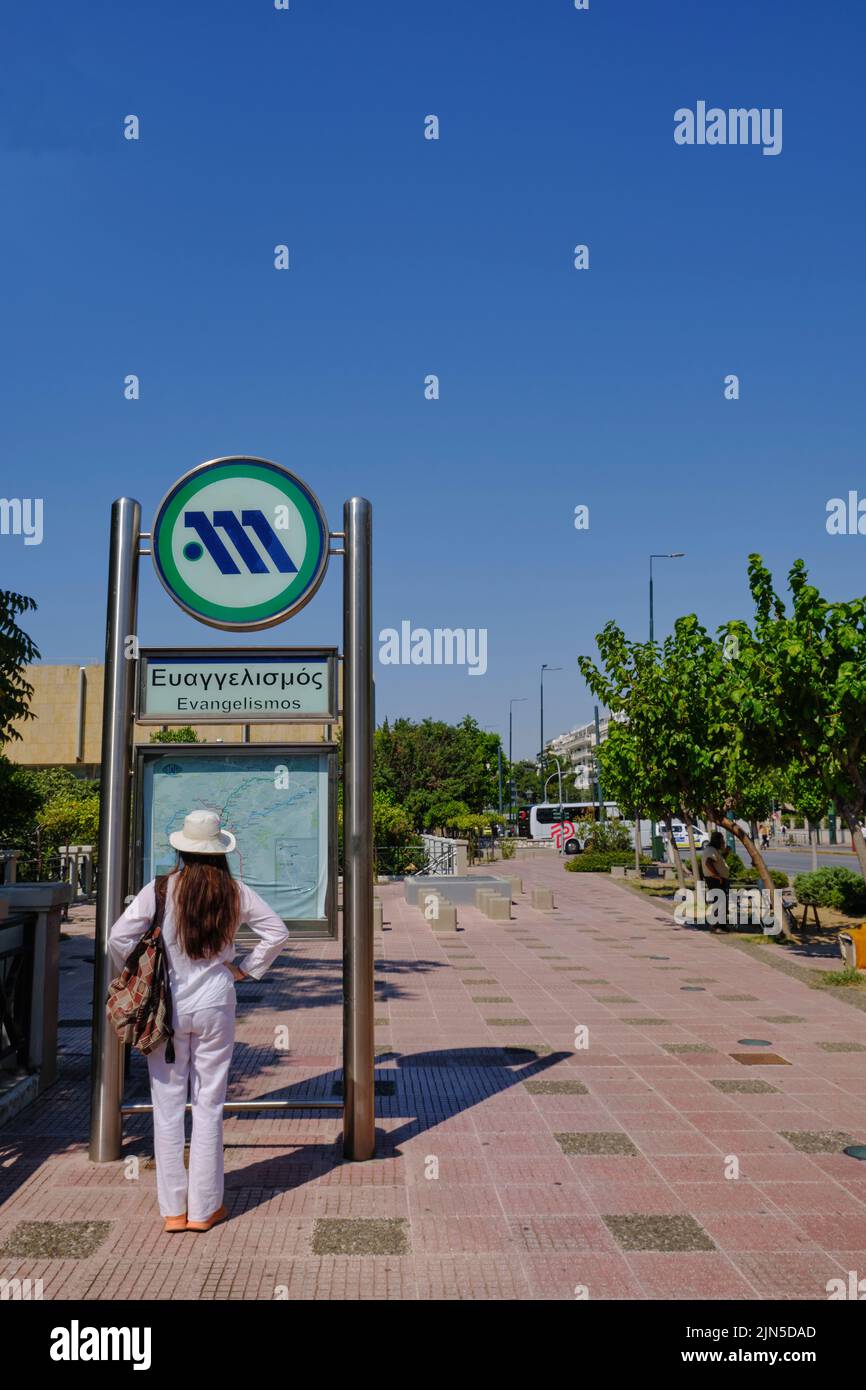 Tourist studies map outside the Evangelismos metro station in Athens in Summer Stock Photo