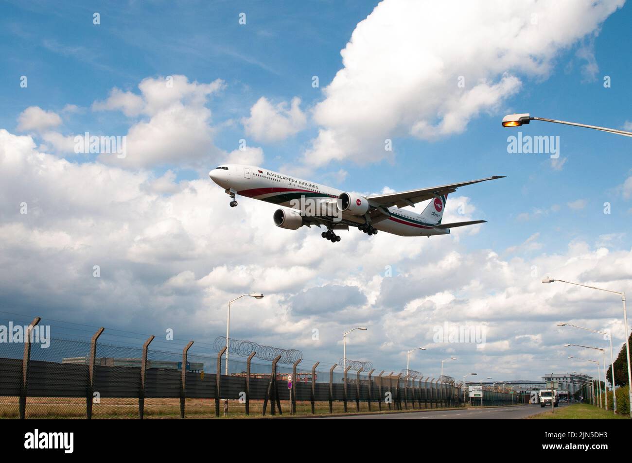 London, UK - August 09, 2022 - Bangladesh Airlines airplane cross the street while landing at Heathrow airport Stock Photo