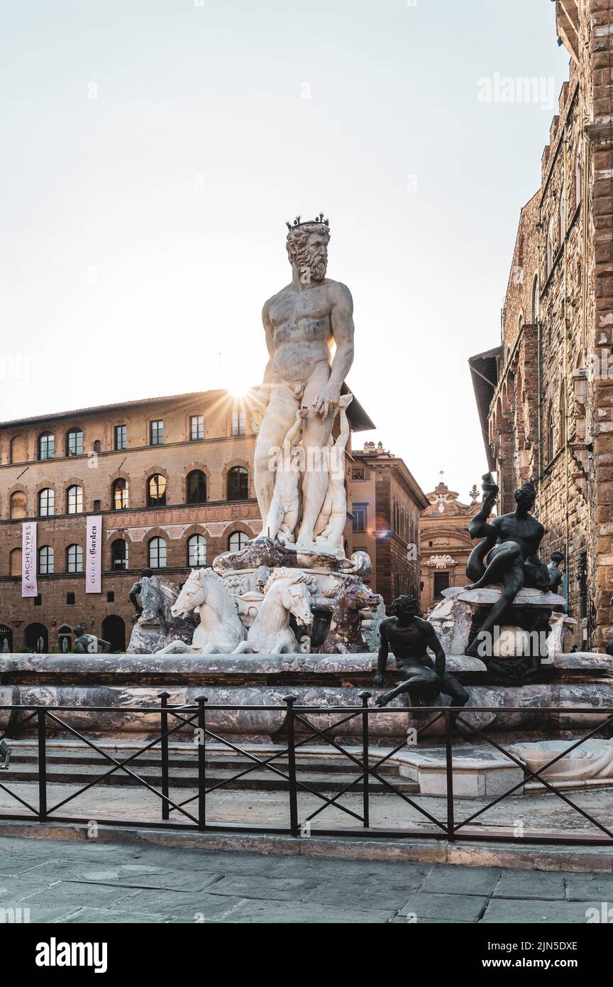 ITALY, TUSCANY, FLORENCE 2022: The Fountain of Neptune located in Piazza della Signoria, pictured in the early morning light Stock Photo