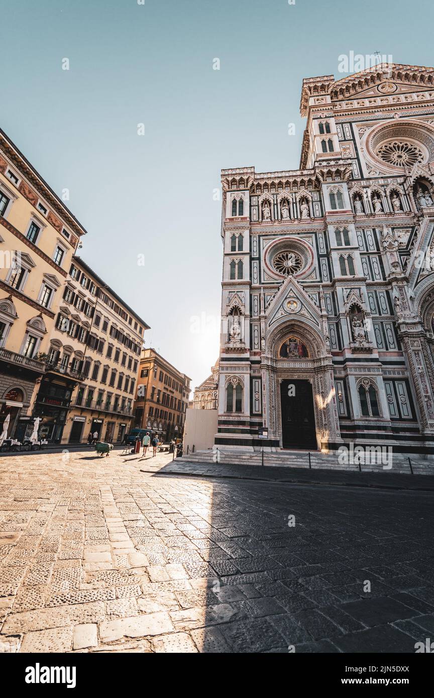 ITALY, TUSCANY, FLORENCE 2022: The complex of Duomo di Firenze with ancient Baptistery, Giotto's Campanile and Brunelleschi's Dome pictured in the early morning light Stock Photo