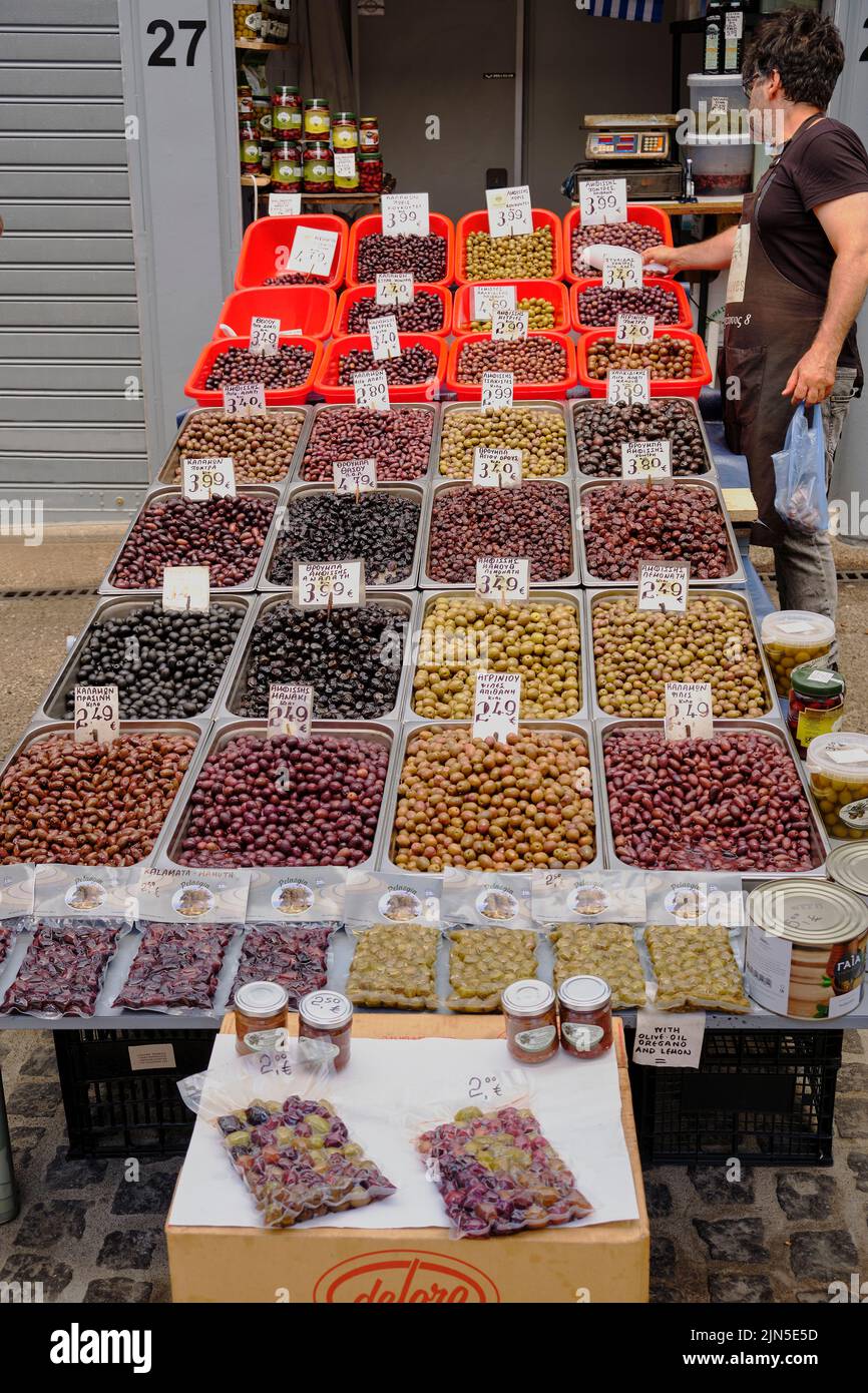 Market stall selling olives in central Athens Stock Photo
