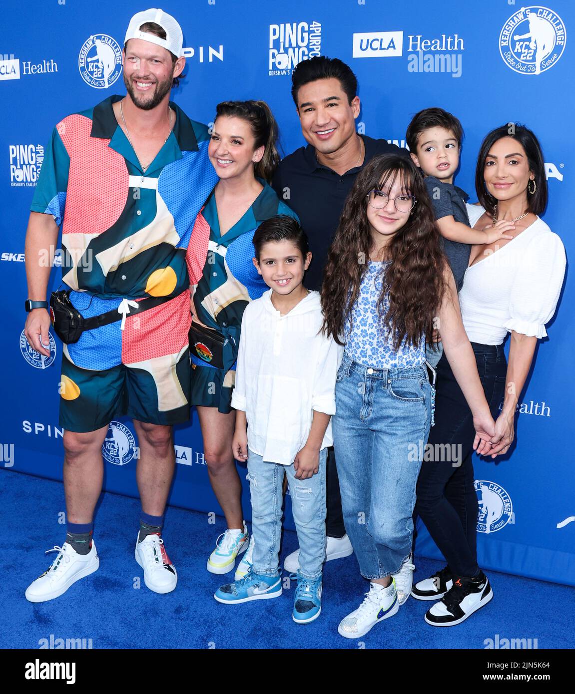 ELYSIAN PARK, LOS ANGELES, CALIFORNIA, USA - AUGUST 08: Clayton Kershaw, Ellen Kershaw, Mario Lopez, Courtney Laine Mazza, Gia Francesca Lopez, Santino Rafael Lopez and Dominic Lopez arrive at Kershaw's Challenge Ping Pong 4 Purpose 2022 held at Dodger Stadium on August 8, 2022 in Elysian Park, Los Angeles, California, United States. (Photo by Xavier Collin/Image Press Agency) Stock Photo