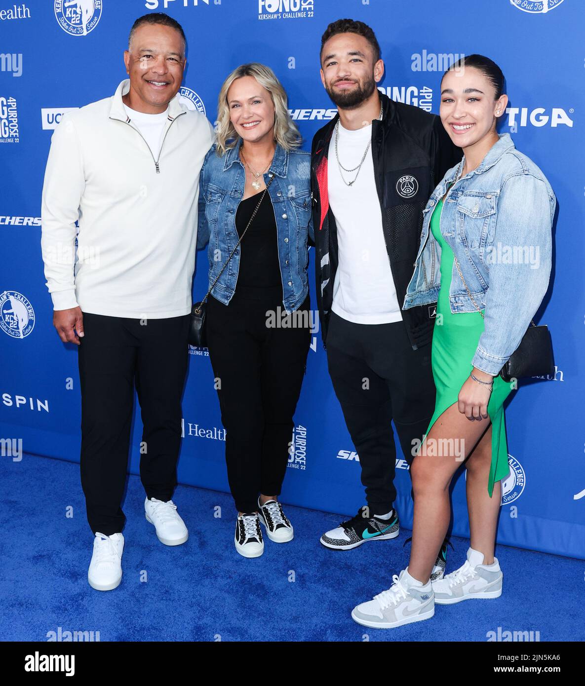 ELYSIAN PARK, LOS ANGELES, CALIFORNIA, USA - AUGUST 08: American professional baseball manager and former outfielder who is the manager of the Los Angeles Dodgers of Major League Baseball Dave Roberts, wife Tricia Roberts, son Cole Roberts and daughter Emmerson Roberts arrive at Kershaw's Challenge Ping Pong 4 Purpose 2022 held at Dodger Stadium on August 8, 2022 in Elysian Park, Los Angeles, California, United States. (Photo by Xavier Collin/Image Press Agency) Stock Photo