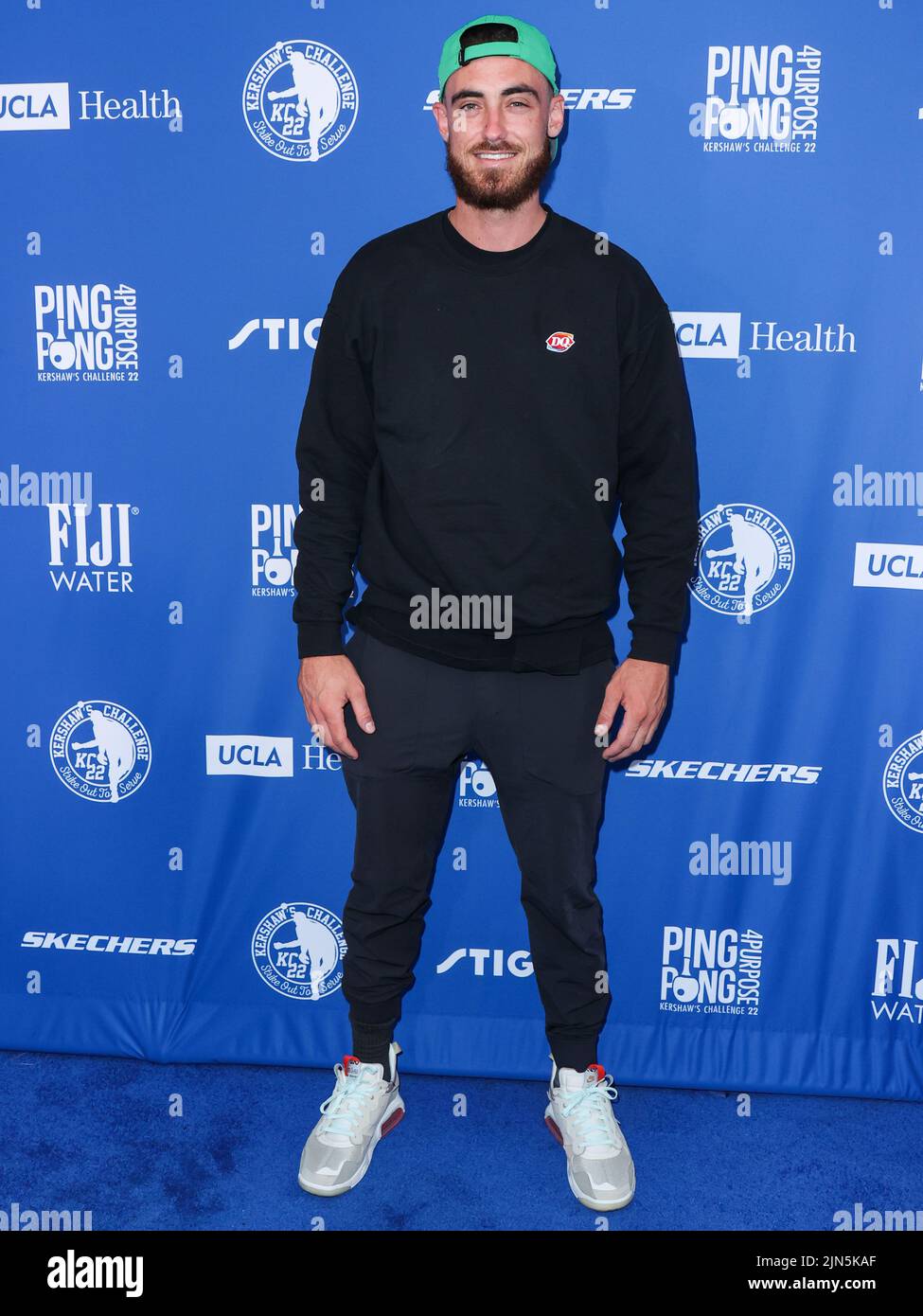 ELYSIAN PARK, LOS ANGELES, CALIFORNIA, USA - AUGUST 08: American professional baseball outfielder and first baseman for the Los Angeles Dodgers of Major League Baseball Cody Bellinger arrives at Kershaw's Challenge Ping Pong 4 Purpose 2022 held at Dodger Stadium on August 8, 2022 in Elysian Park, Los Angeles, California, United States. (Photo by Xavier Collin/Image Press Agency) Stock Photo