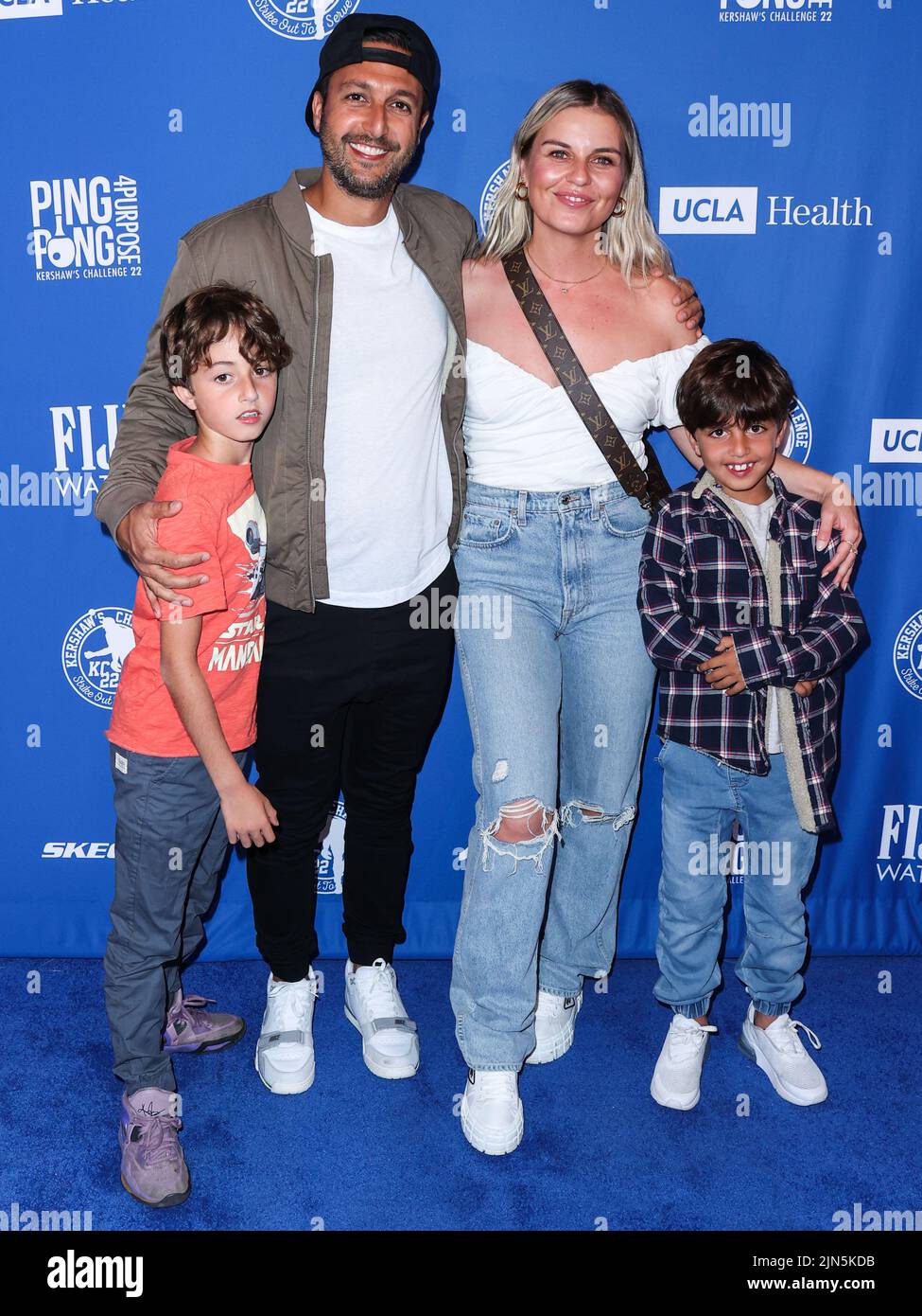 ELYSIAN PARK, LOS ANGELES, CALIFORNIA, USA - AUGUST 08: Roby Yadegar and Tanya Rad arrive at Kershaw's Challenge Ping Pong 4 Purpose 2022 held at Dodger Stadium on August 8, 2022 in Elysian Park, Los Angeles, California, United States. (Photo by Xavier Collin/Image Press Agency) Stock Photo