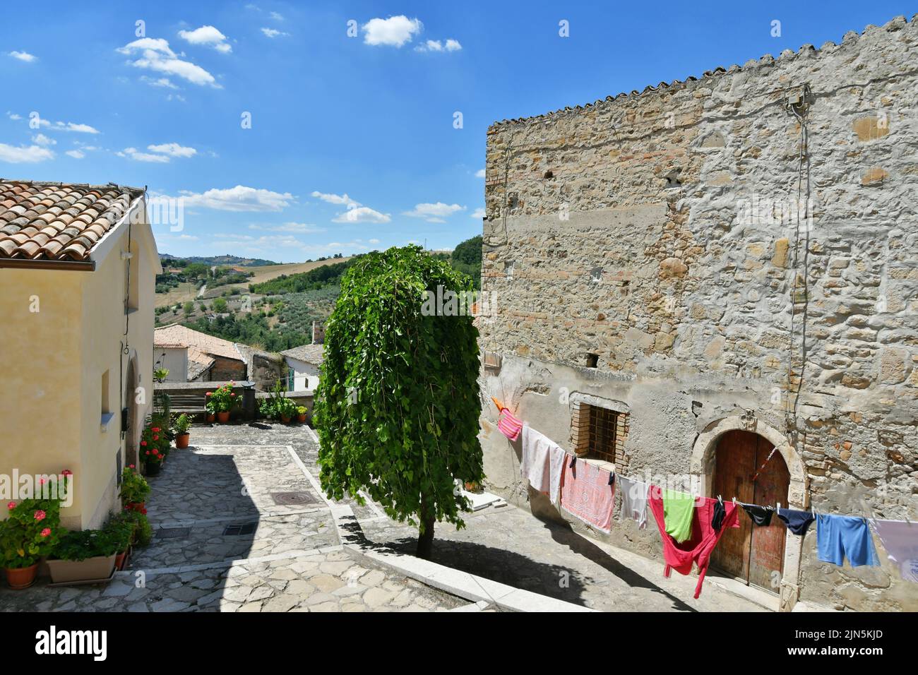 A small street between the old houses of Zungoli, one of the most