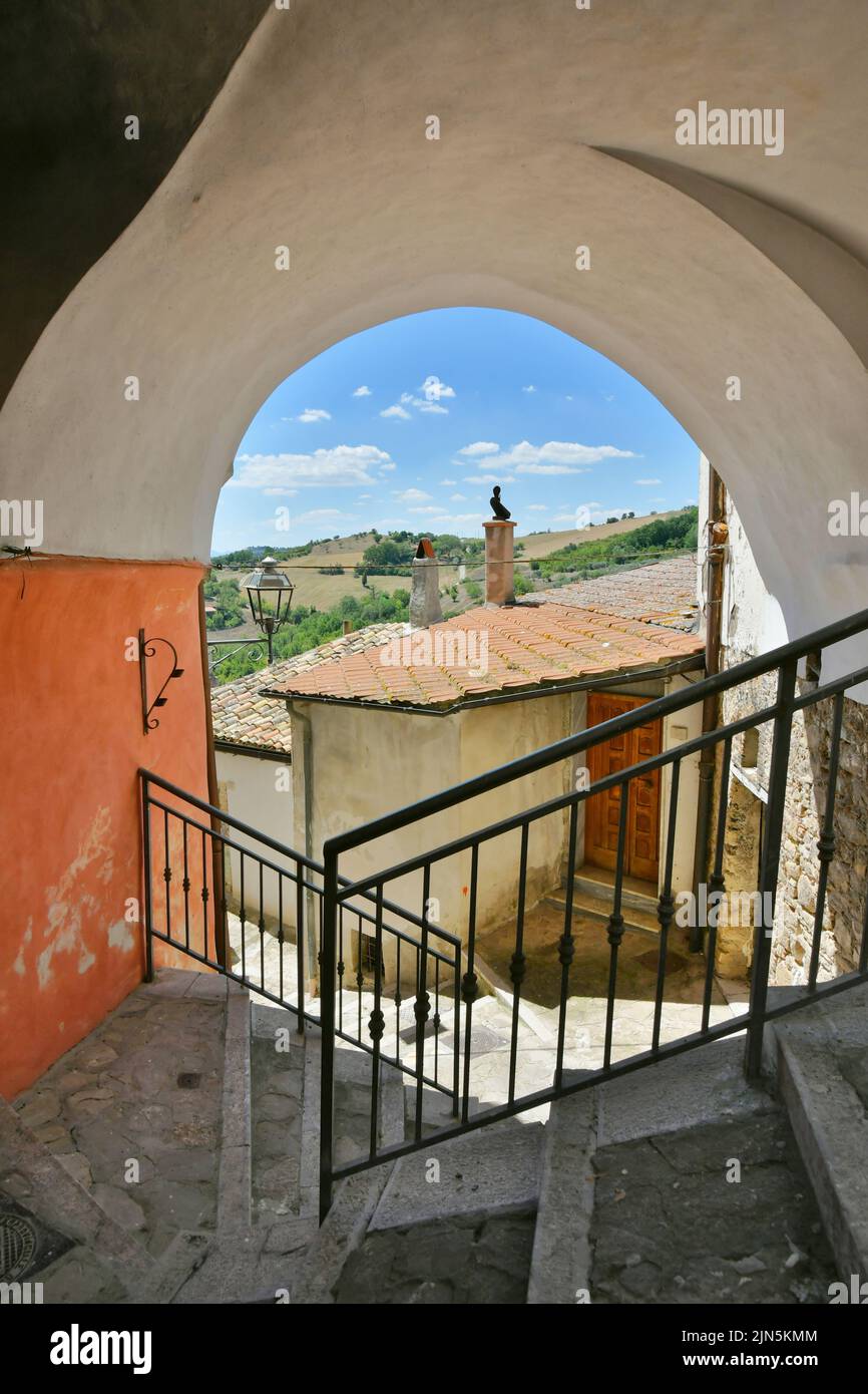A small street between the old houses of Zungoli, one of the most