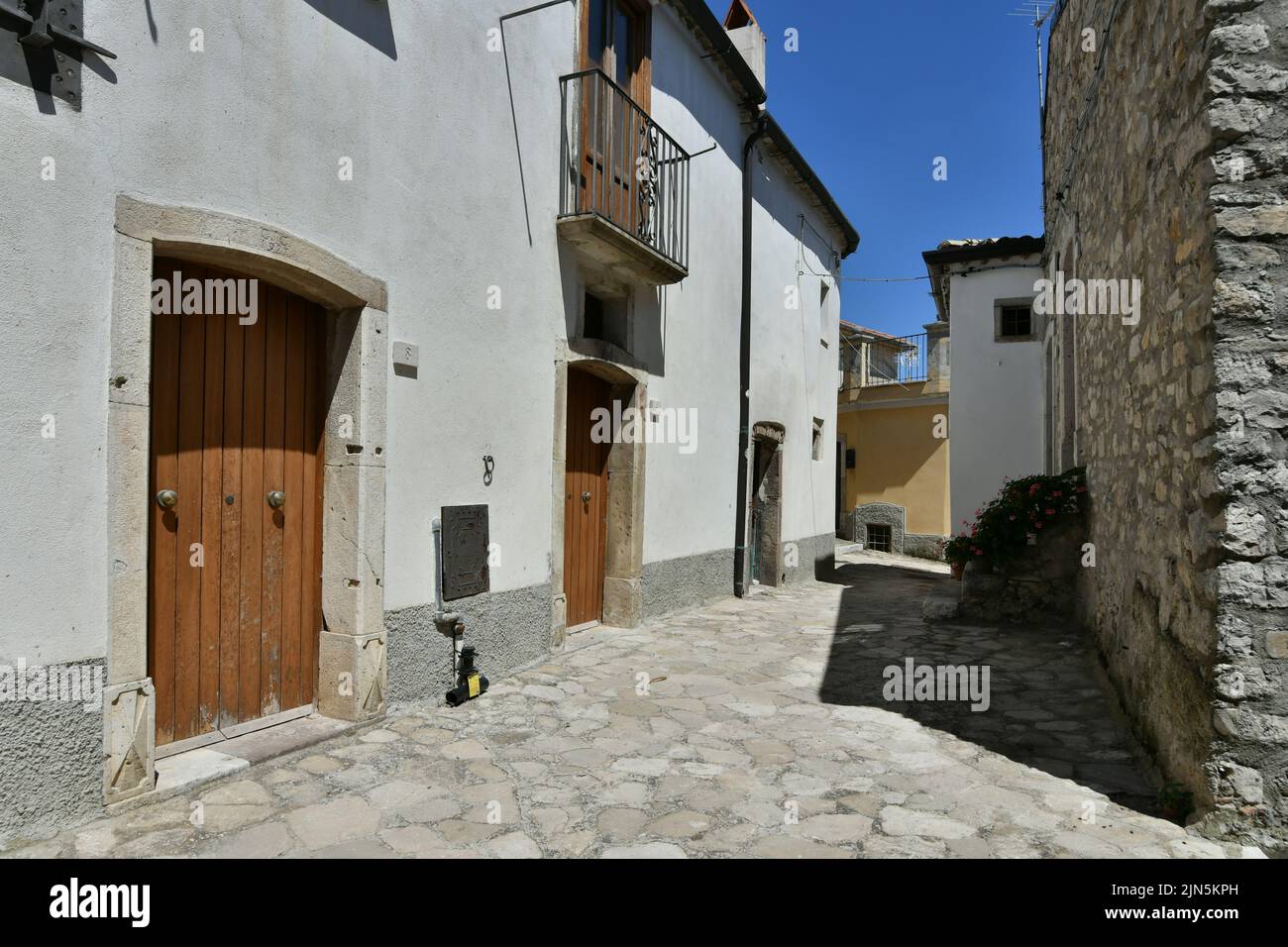 A small street between the old houses of Zungoli, one of the most