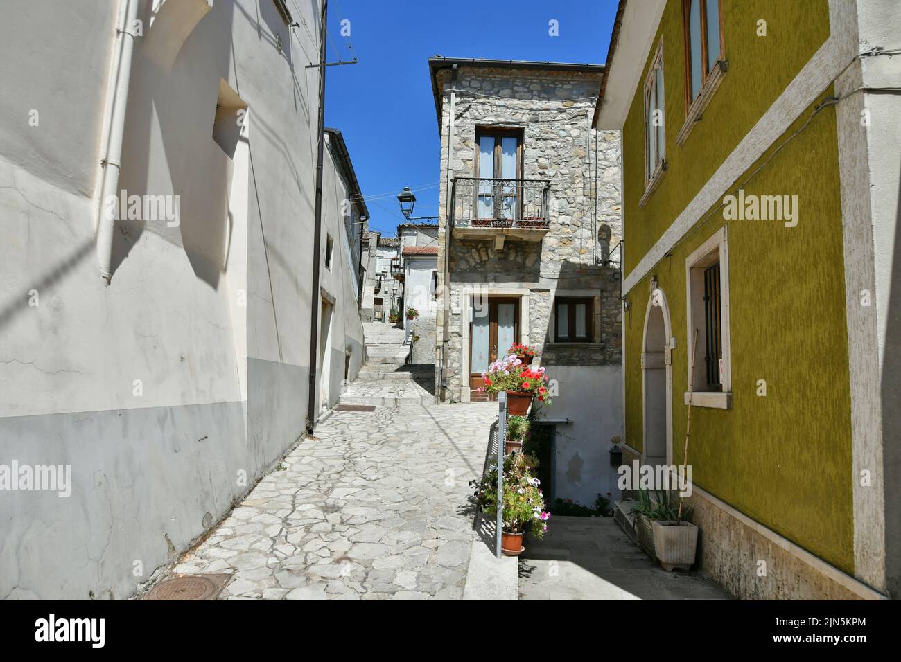 A small street between the old houses of Zungoli, one of the most