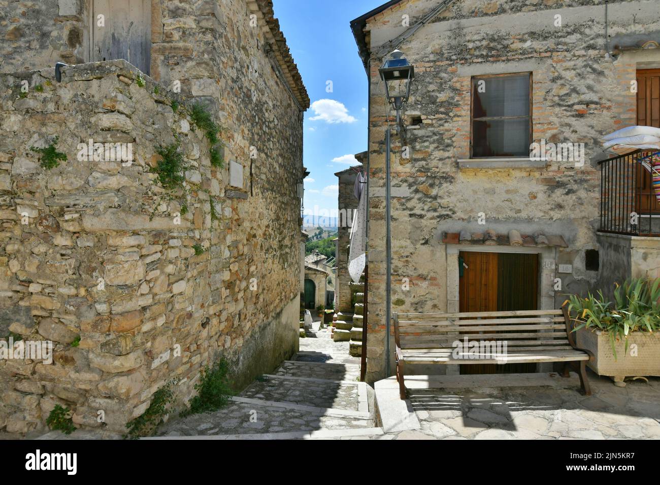 A small street between the old houses of Zungoli, one of the most