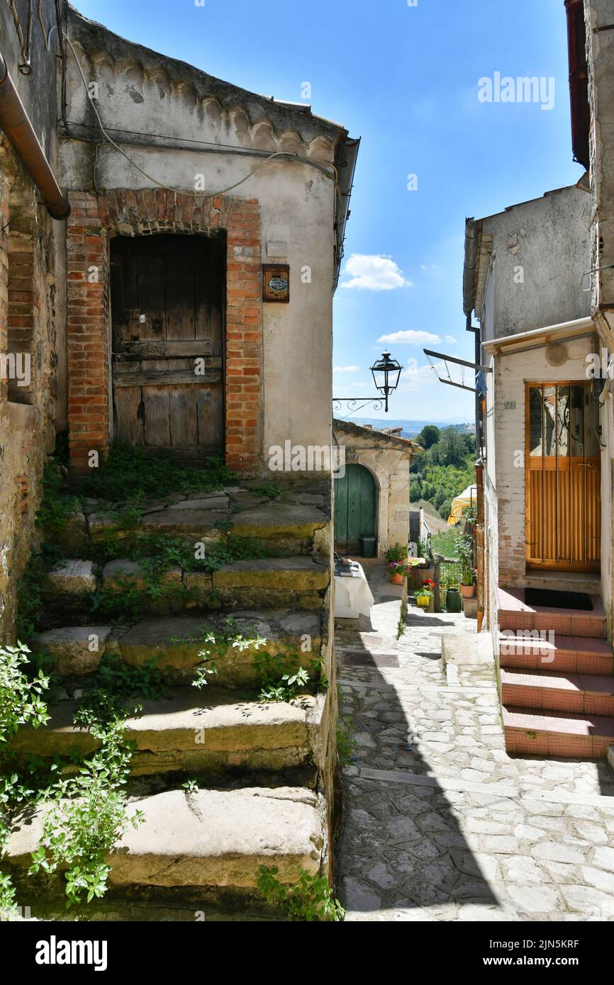 A small street between the old houses of Zungoli, one of the most
