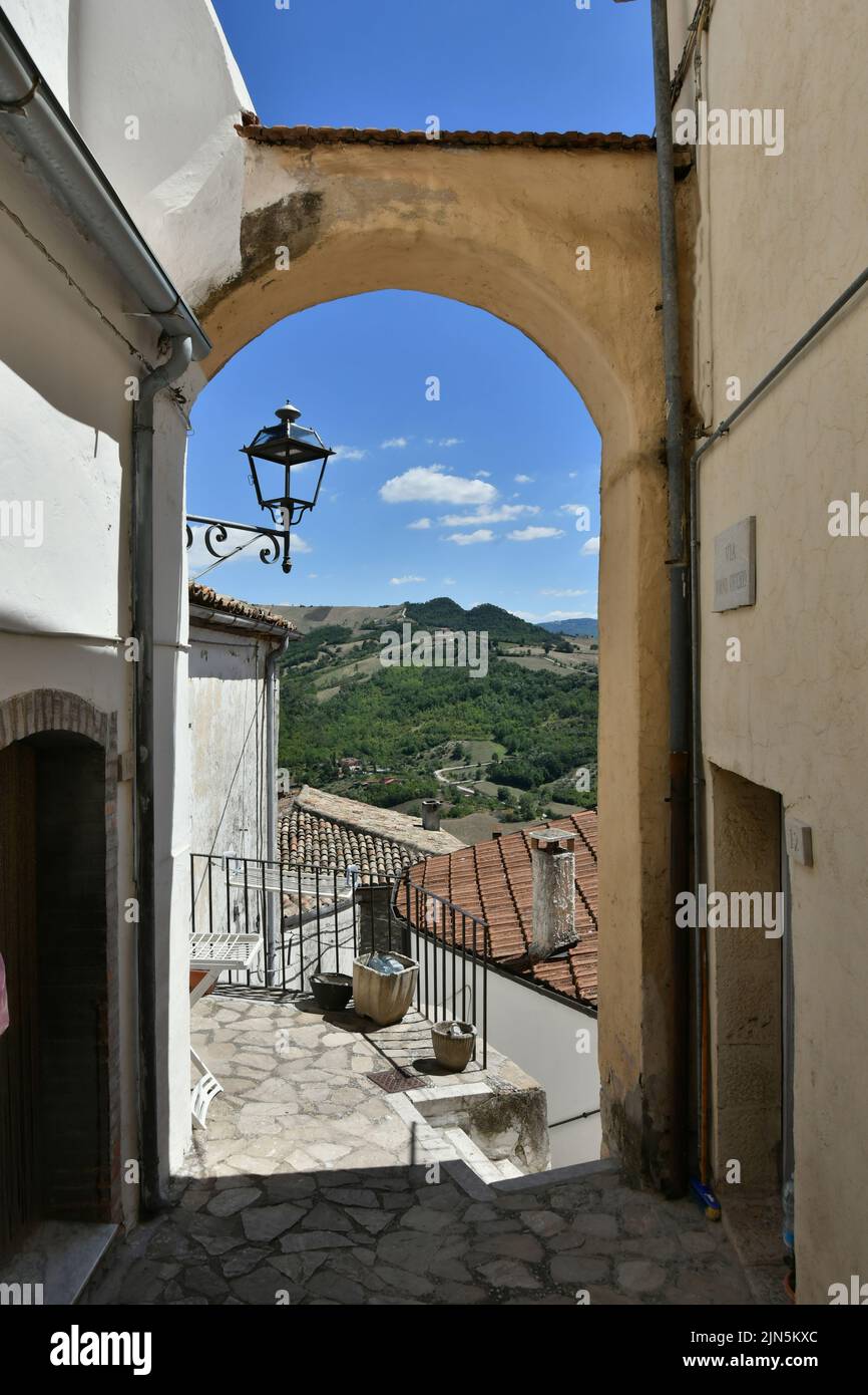 A small street between the old houses of Zungoli, one of the most