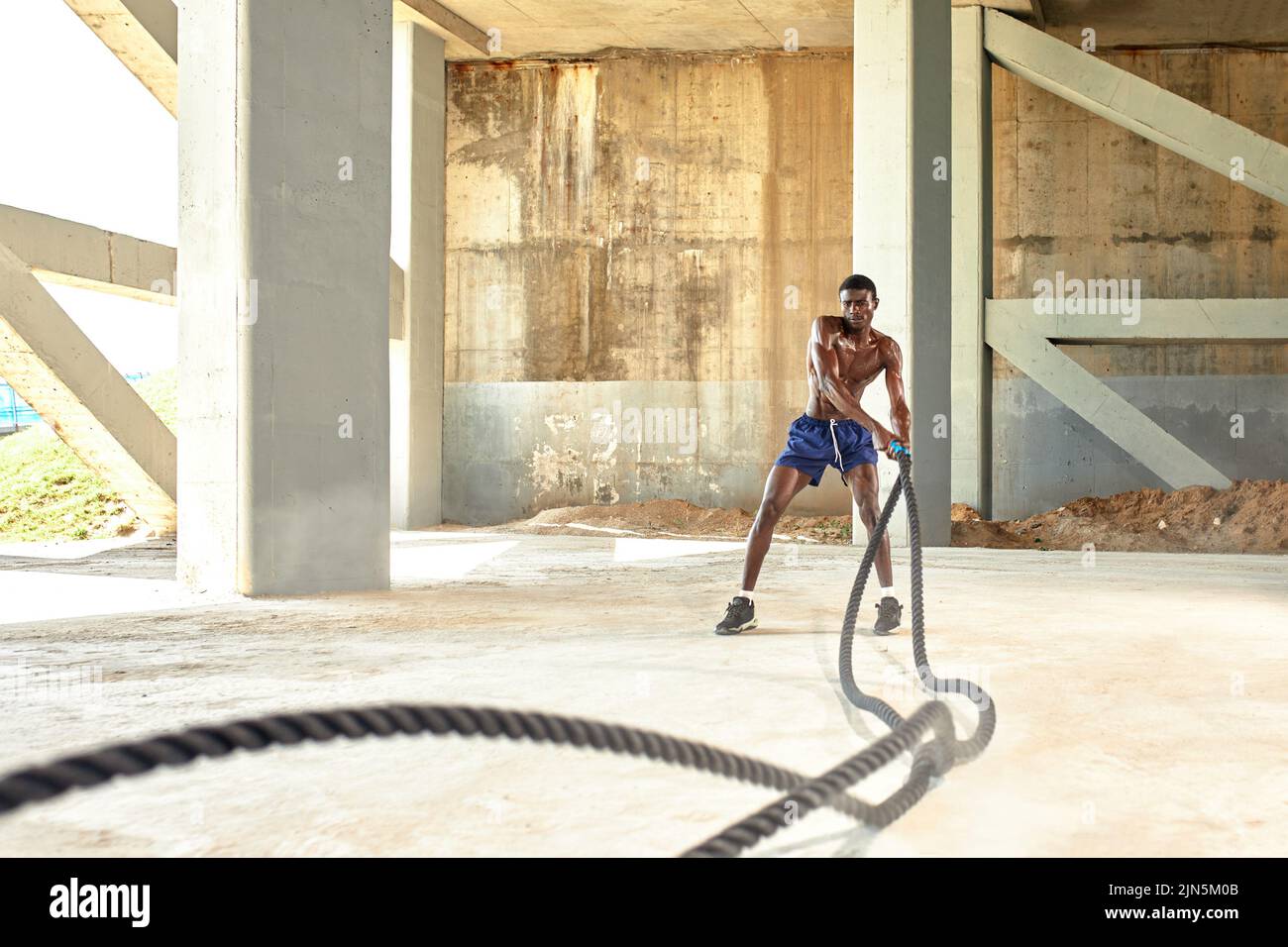 Battle ropes on concrete hotsell