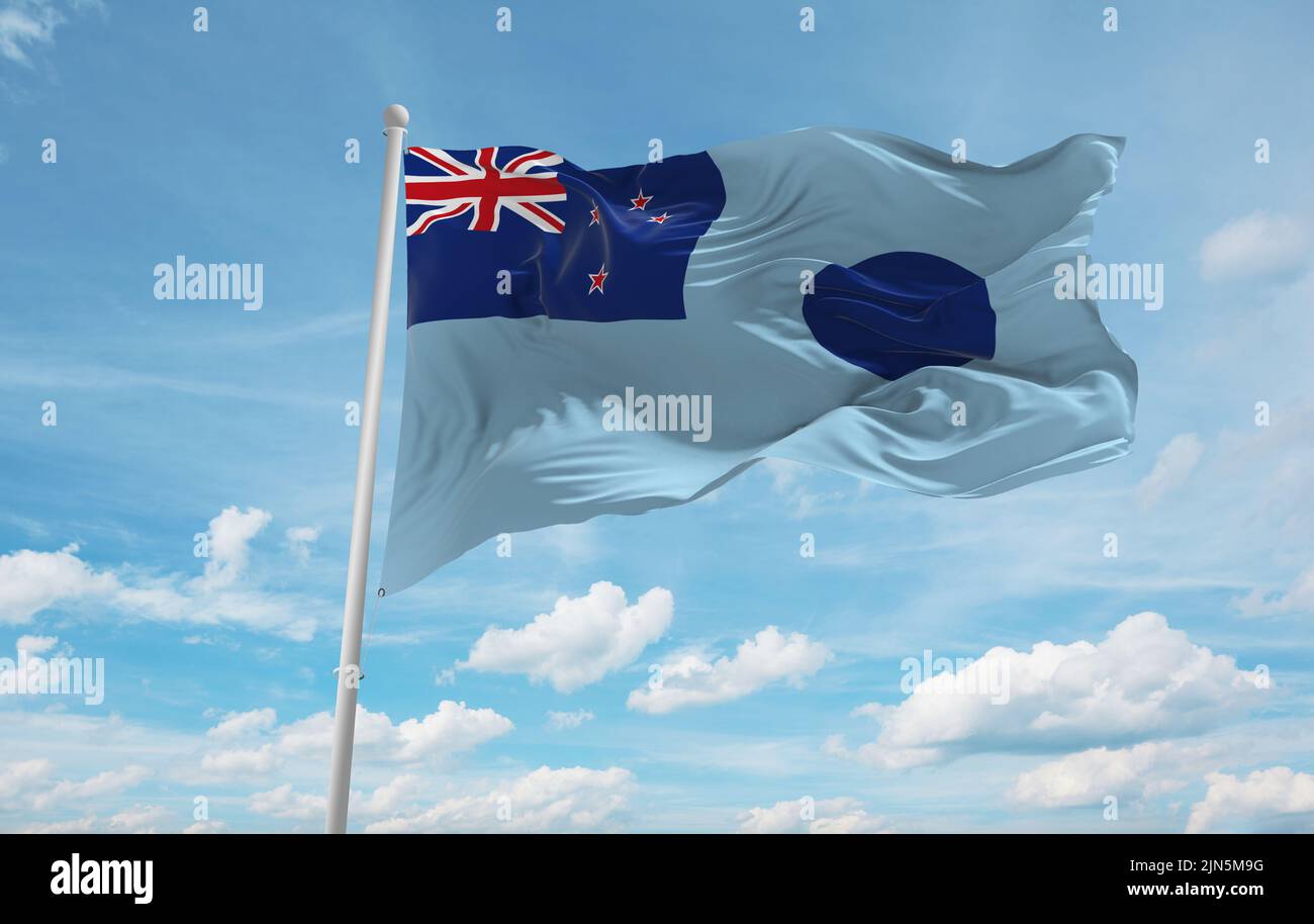 official flag of Ministry of Transport 1968 1998 New Zealand at cloudy sky background on sunset, panoramic view. New Zealand travel and patriot concep Stock Photo