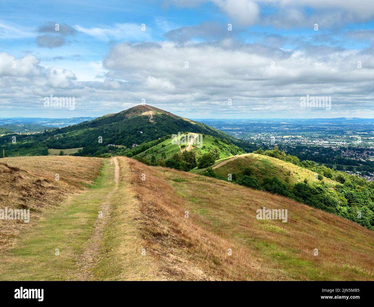 Looking from Pinnacle Hill to Jubilee Hill Perseverance Hill and Worcestershire Beacon in the Malvern Hills AONB England Stock Photo