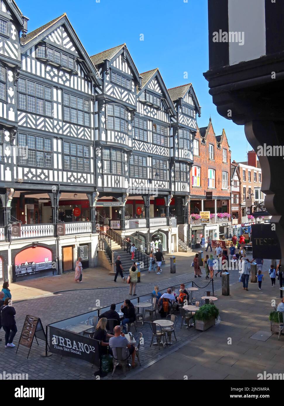 Main entrance showing Rows, Grosvenor shopping centre mall, Bridge Street, Chester, Cheshire, England, UK, CH1 1NW Stock Photo