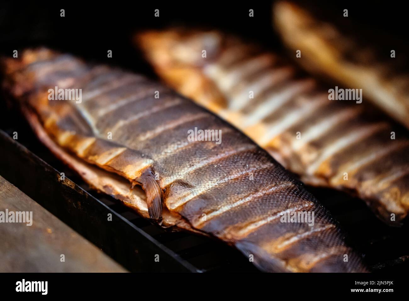 Rainbow trout smoked on grill bbq Stock Photo Alamy
