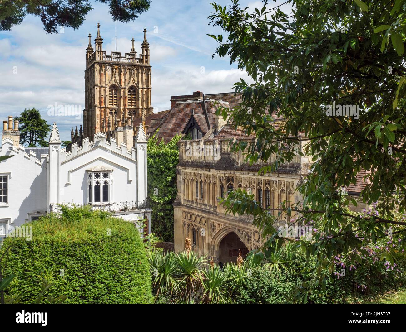 Tower of Great Malvern Priory and the Abbey Gateway in Great Malvern Worcestershire England Stock Photo