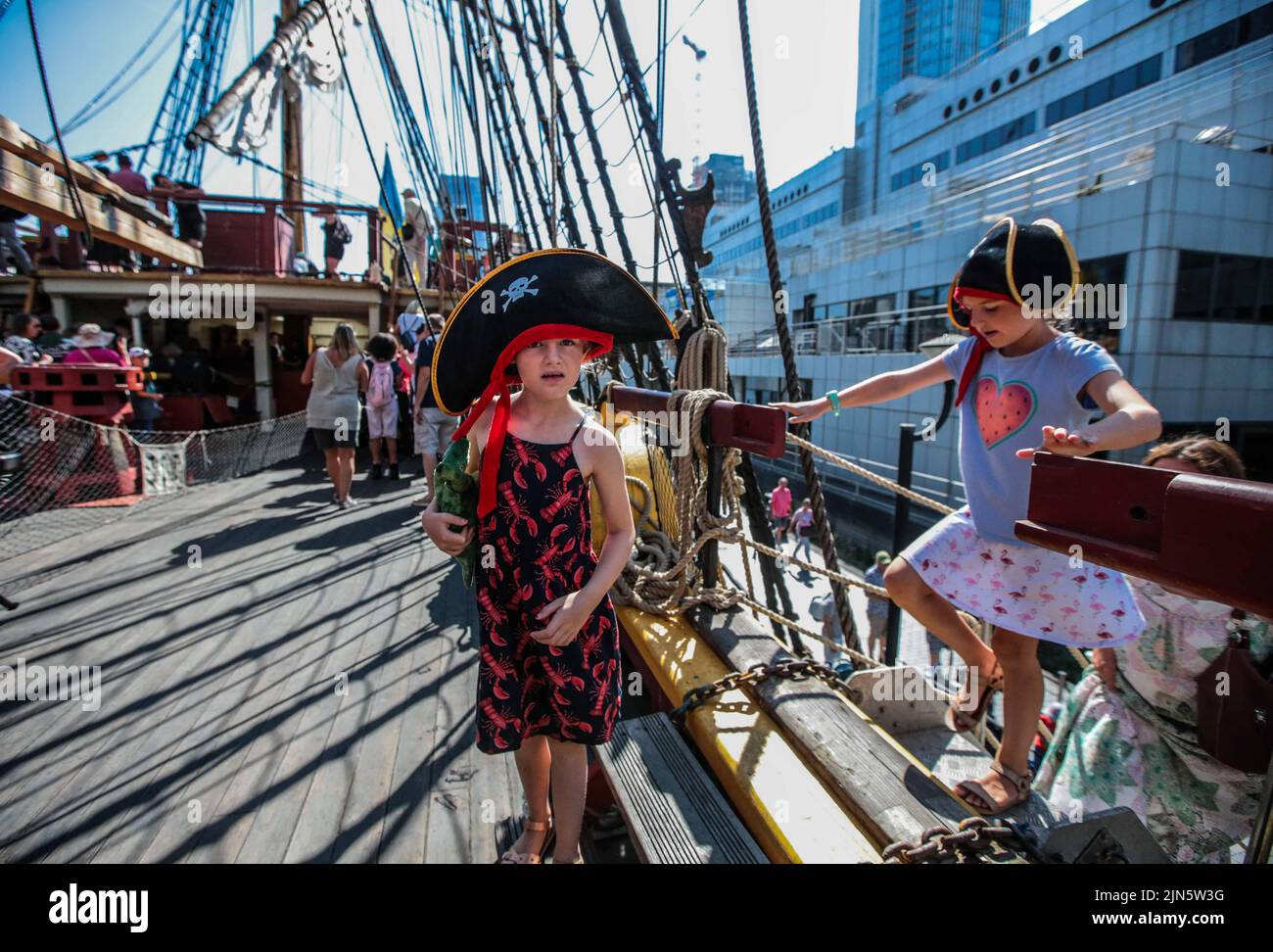 London UK 9 August 2022 Two pirates come on board to  visit the Replica 18th century Swedish ship Götheborg docked at South Dock Quay in Canary Wharf. Open to visitors every day until 12 of August  Paul Quezada-Neiman/Alamy Live News Stock Photo