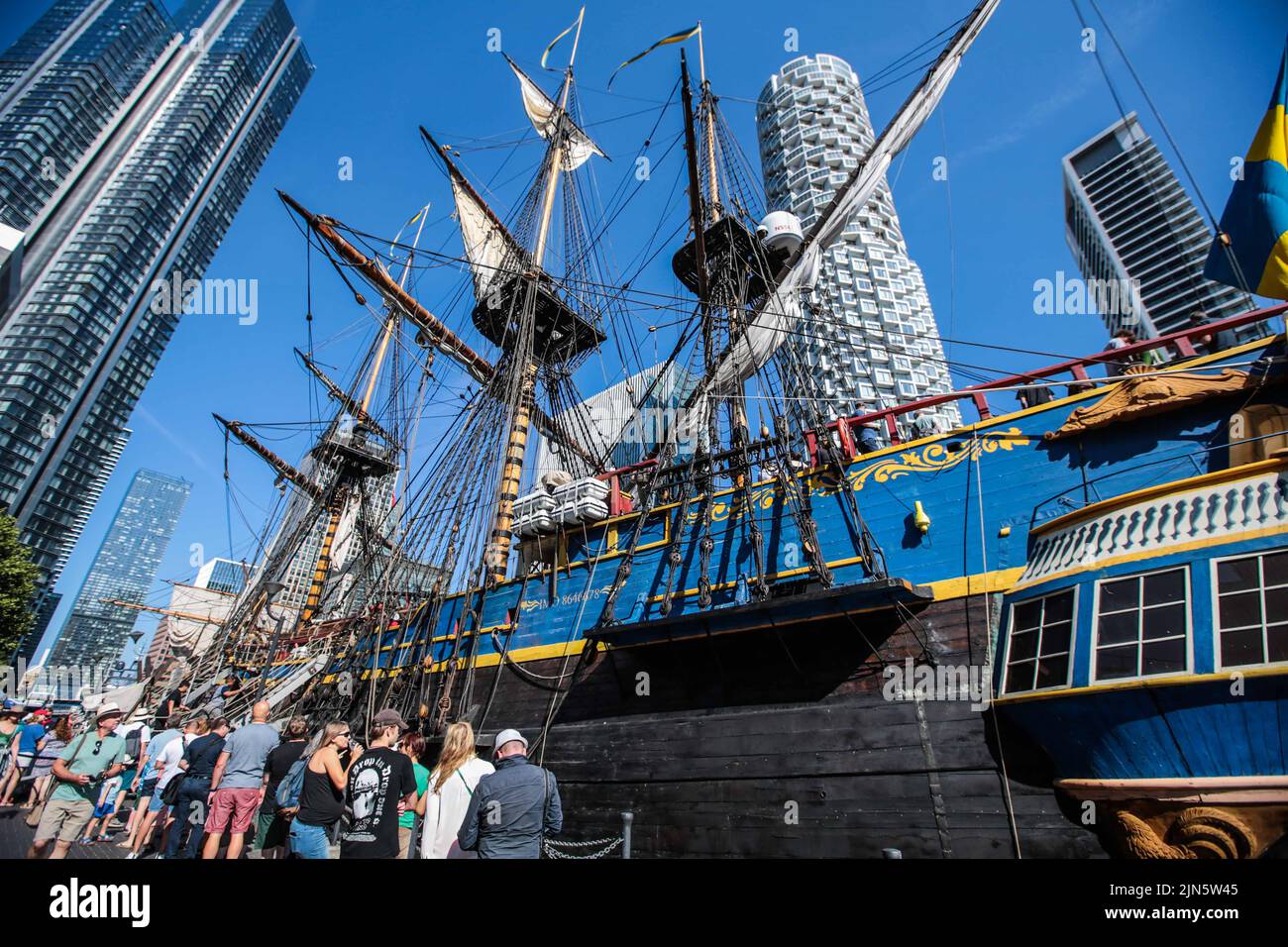 London UK 9 August 2022 Large queues formed at South Quay today to visit the Replica 18th century Swedish ship Götheborg docked at South Dock Quay in Canary Wharf. Open to visitors every day until 12 of August  Paul Quezada-Neiman/Alamy Live News Stock Photo