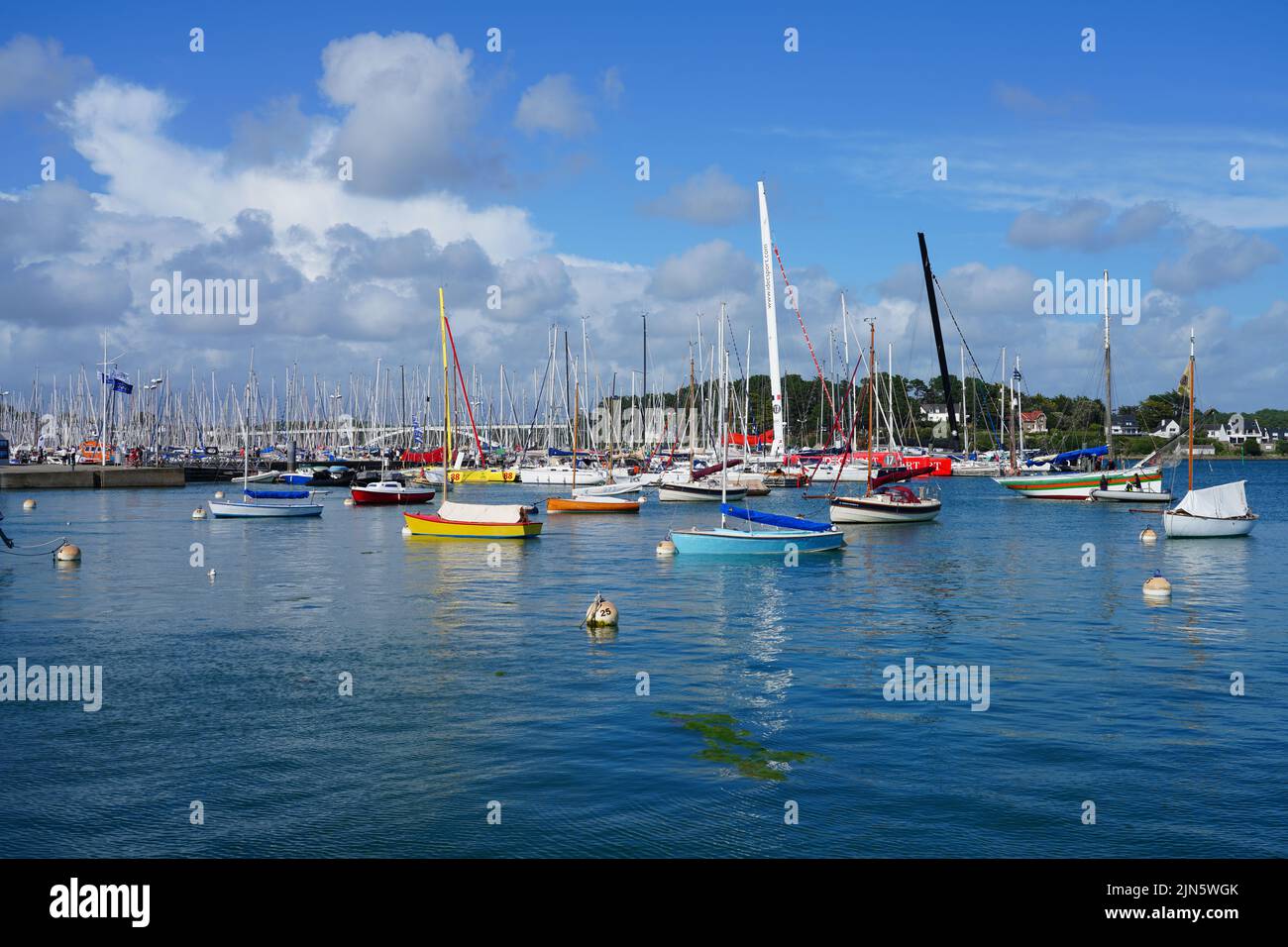 LA-TRINITE-SUR-MER, FRANCE -7 AUG 2021- View of boats in the harbor of La Trinite sur Mer, a pleasure boats harbor on the Bay of Quiberon in Morbihan, Stock Photo