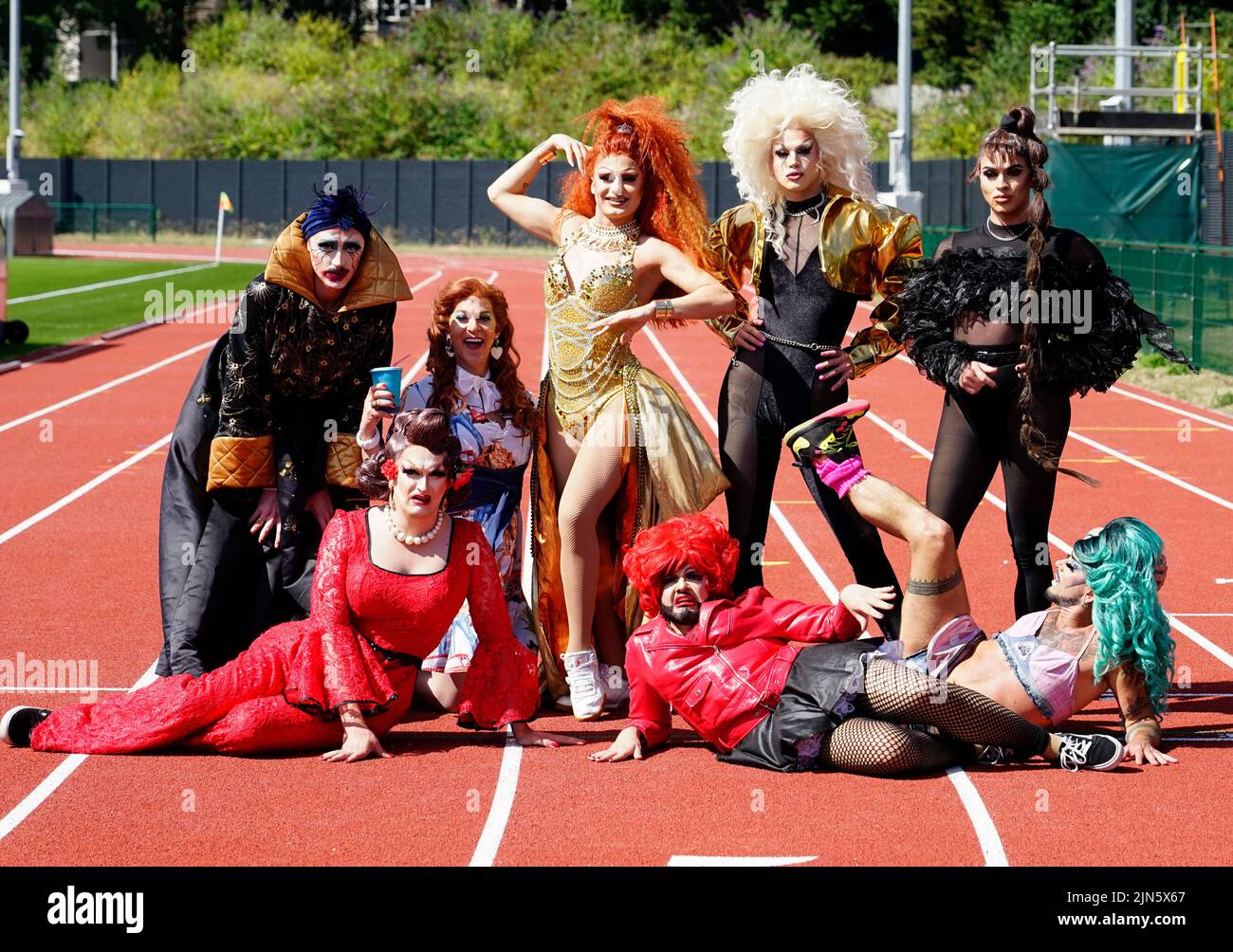 Edinburgh, Scotland, UK. 9th August 2022.  Drag queens from several shows performing as part of the Edinburgh Fringe 2022 Toake part in a Drag Race on the running track at the redeveloped Meadowbank stadium in Edinburgh today. From left; Seayonce, Kate Butch, Dixie Longate, Belle Du Ball, Crudi Dench, Enter Serenity, Nastia, Captain Kidd.  Iain Masterton/Alamy Live News Stock Photo