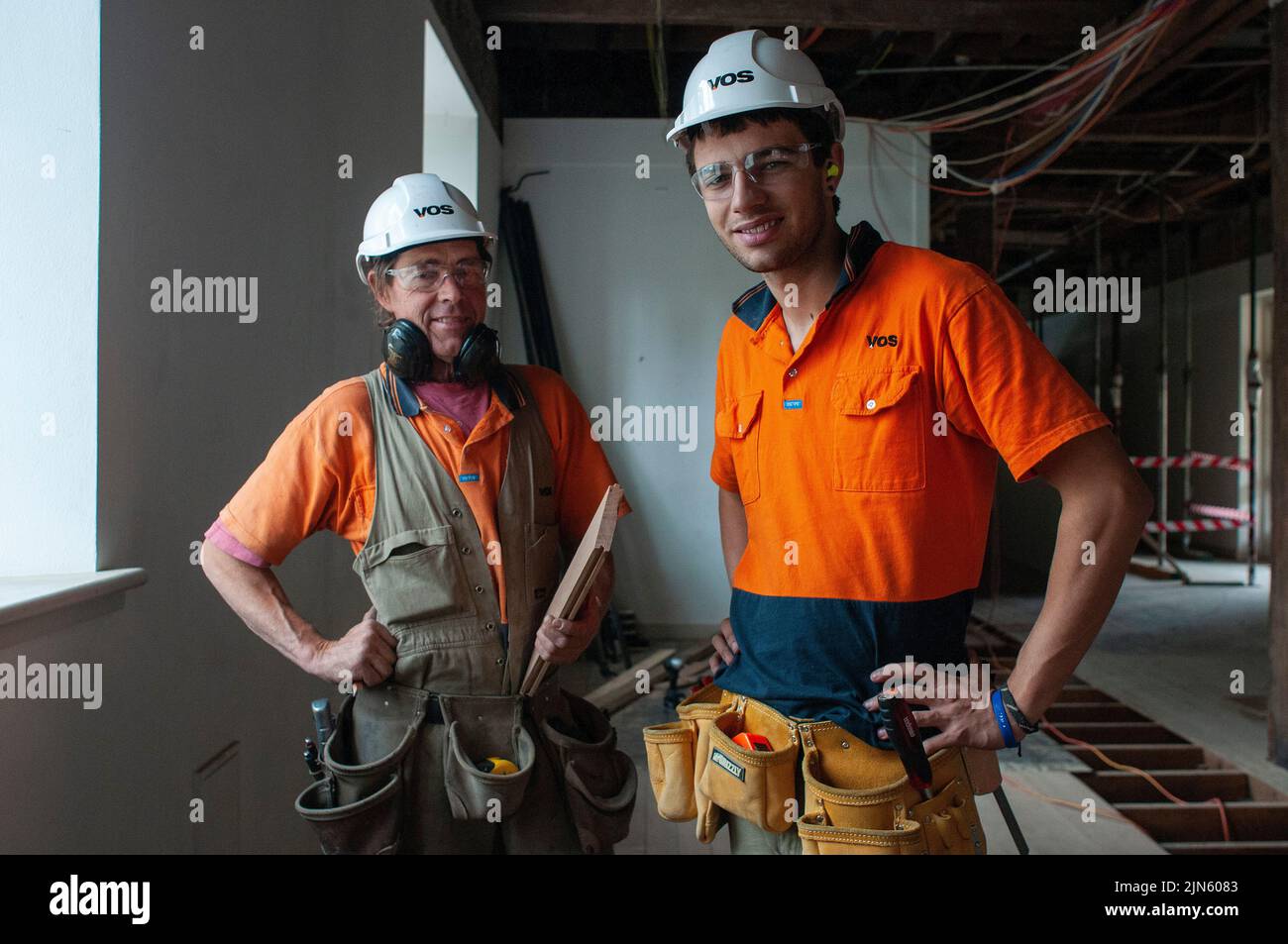 Carpenter and you apprentice working on the renovation of the Tasmanian Museum and aArt Gallery un Hobart Stock Photo