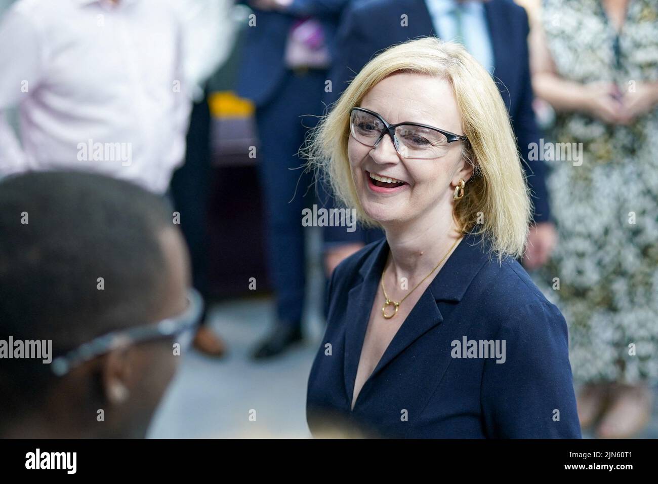 Britain's Conservative Party leadership candidate Liz Truss meets apprentices during a visit to the Reliance Precision engineering company ahead of a hustings event later, in Huddersfield, Britain August 9, 2022. Ian Forsyth/Pool via REUTERS Stock Photo