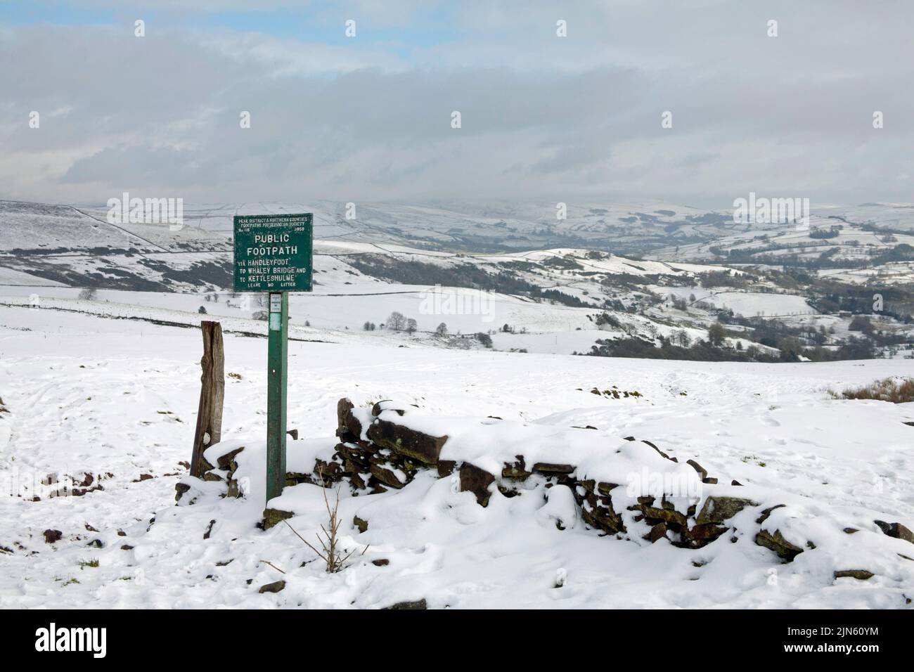 Cast iron Footpath sign Bownstone gate on a winter day above Lyme Park Cheshire England Stock Photo