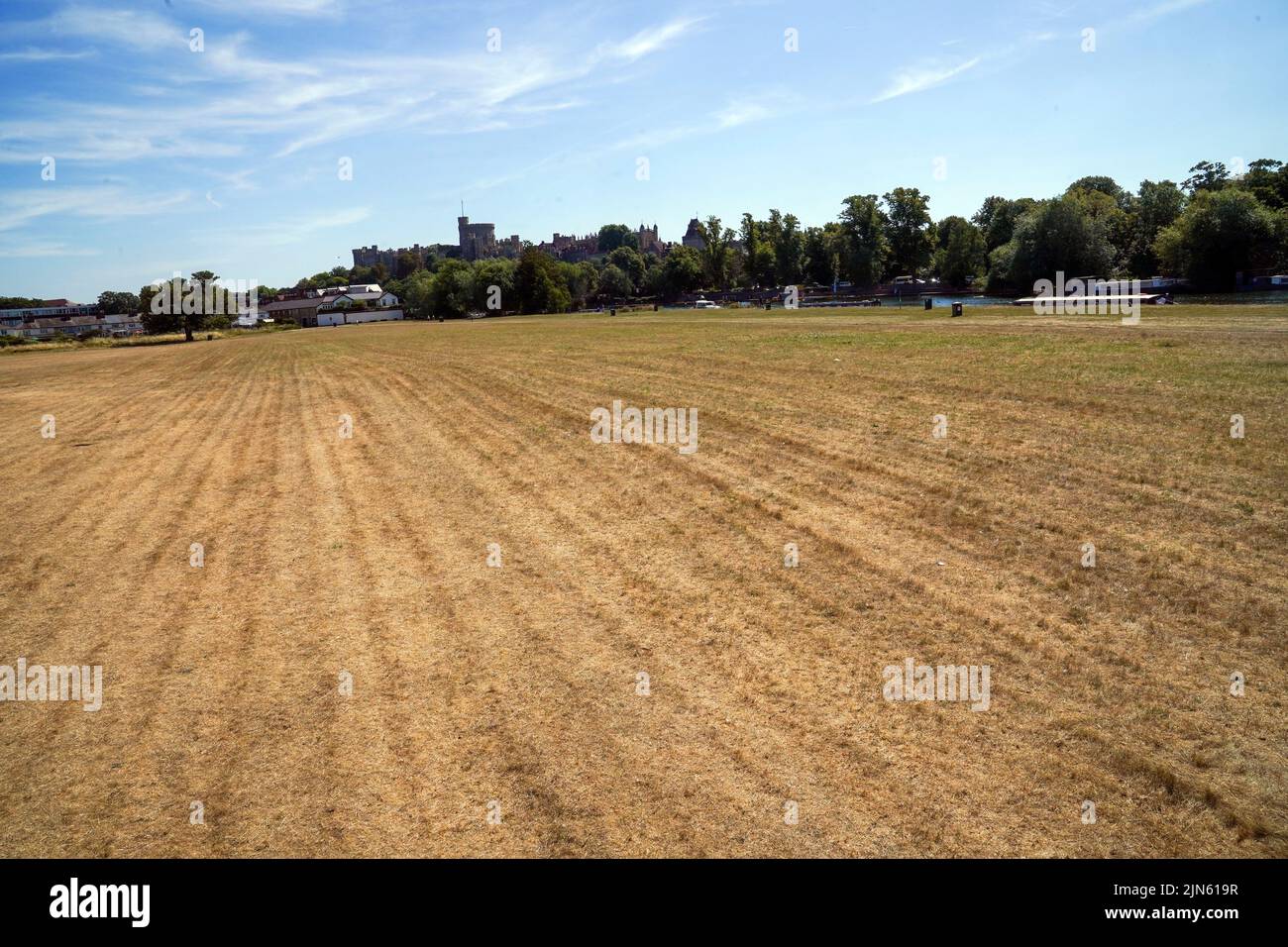 The Brocas grass meadow in Eton, as a summer of hosepipe bans and fire warnings continues, with a heat health alert coming into place across much of the country. Picture date: Tuesday August 9, 2022. Stock Photo