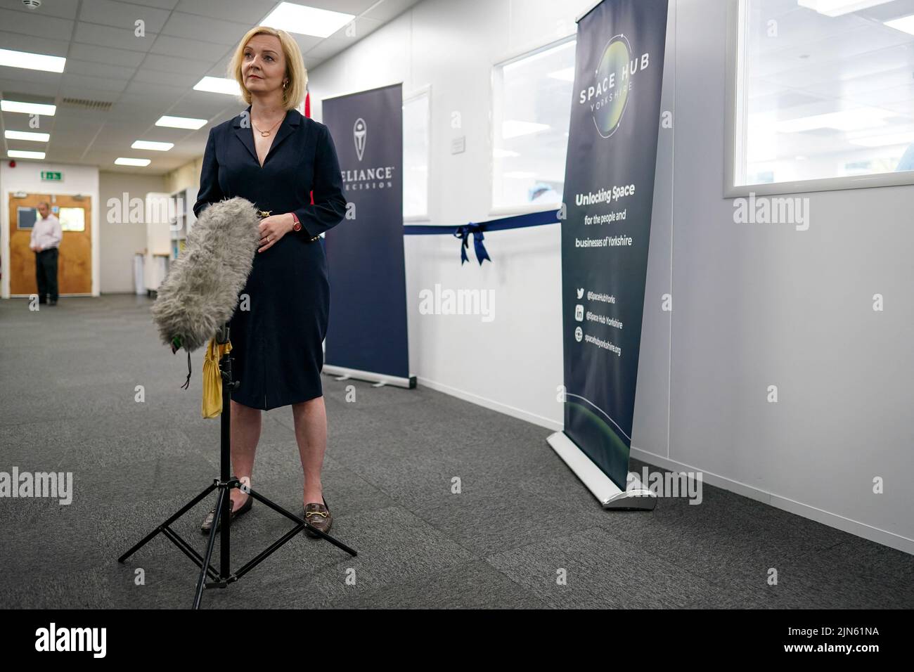 Britain's Conservative Party leadership candidate Liz Truss speaks to the media as she visits the Reliance Precision engineering company ahead of a hustings event later, in Huddersfield, Britain August 9, 2022. Ian Forsyth/Pool via REUTERS Stock Photo