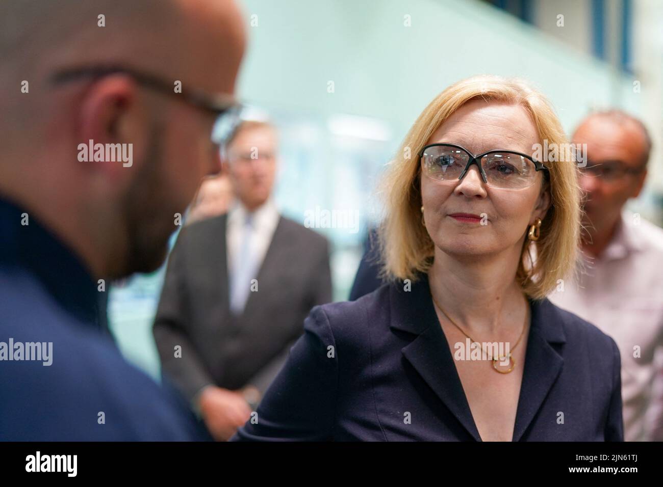 Britain's Conservative Party leadership candidate Liz Truss visits the Reliance Precision engineering company ahead of a hustings event later, in Huddersfield, Britain August 9, 2022. Ian Forsyth/Pool via REUTERS Stock Photo