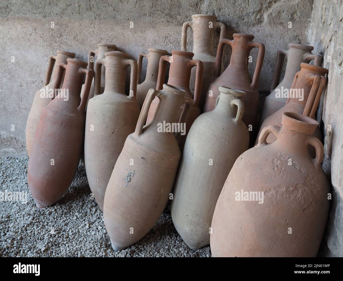 Roman terracotta amphora in a house in the Pompeii excavation site, Pompei, Campania, Italy Stock Photo