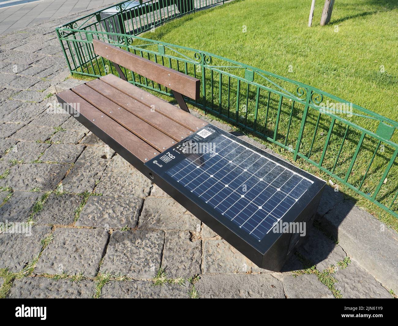 Viva smart bench with solar panel and wifi, qr code, in Sorrento, Campania, Italy Stock Photo