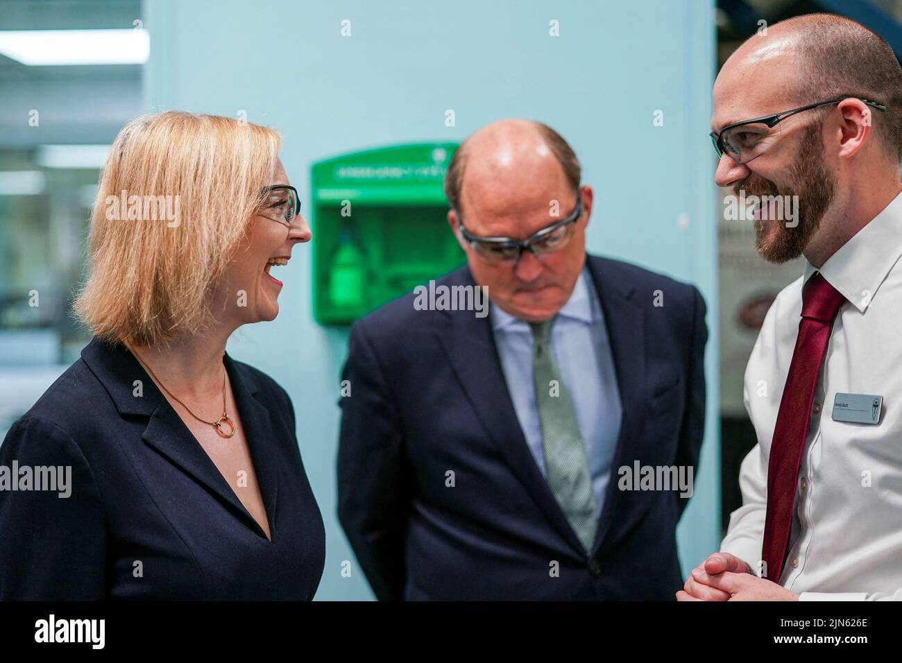 Britain's Conservative Party leadership candidate Liz Truss and British Defence Secretary Ben Wallace visit the Reliance Precision engineering company ahead of a hustings event later, in Huddersfield, Britain August 9, 2022. Ian Forsyth/Pool via REUTERS Stock Photo
