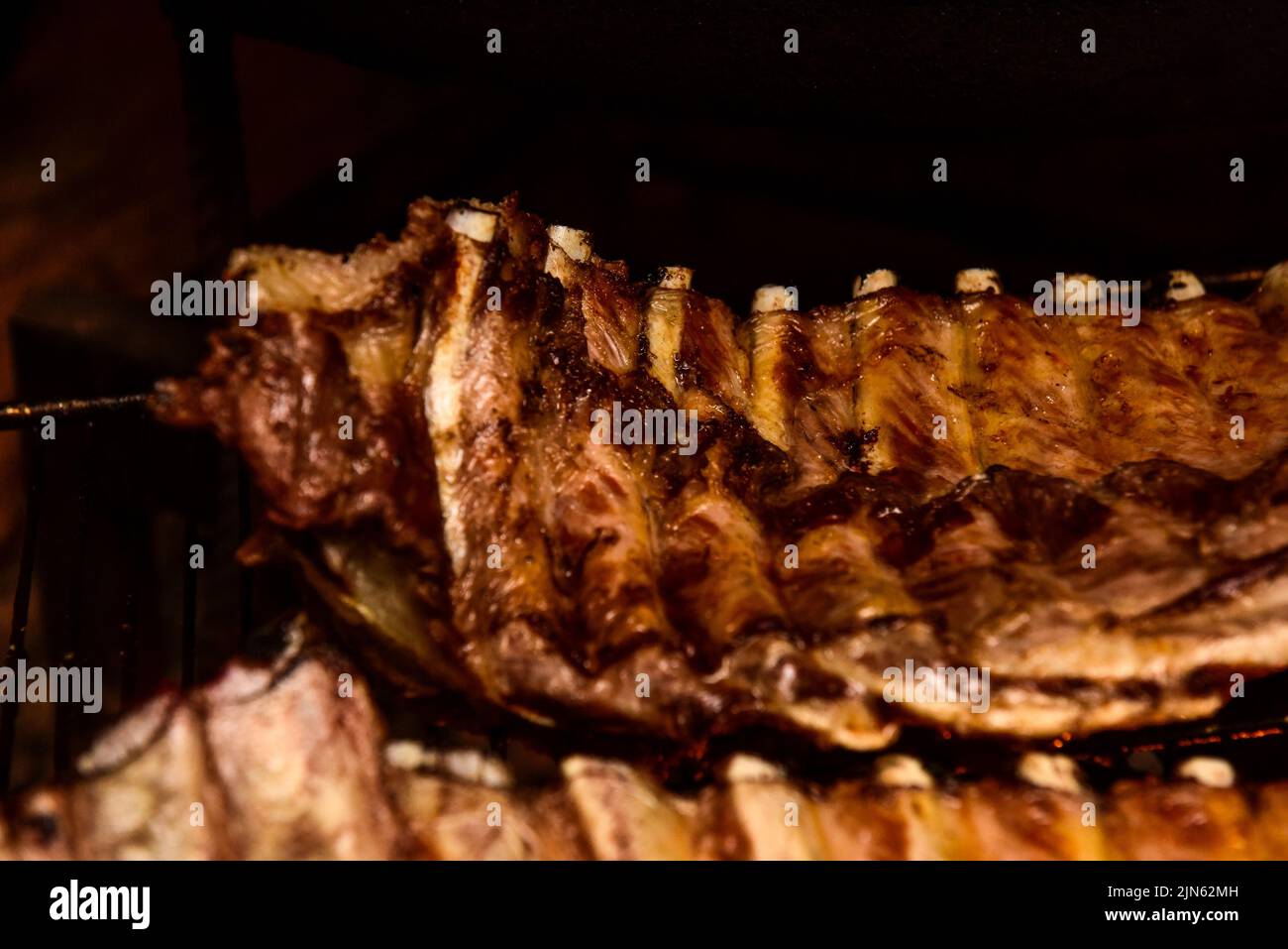 Roasted Crispy Ribs, traditional Argentinian barbecue Stock Photo - Alamy