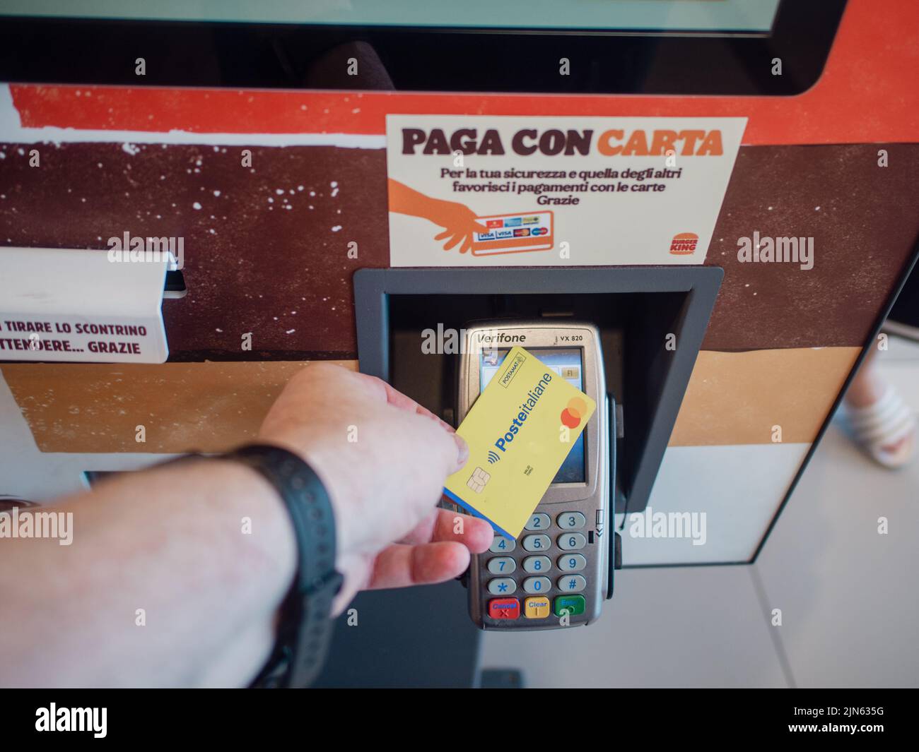 woman orders meal in the electronic touch screen terminal menu in the ...