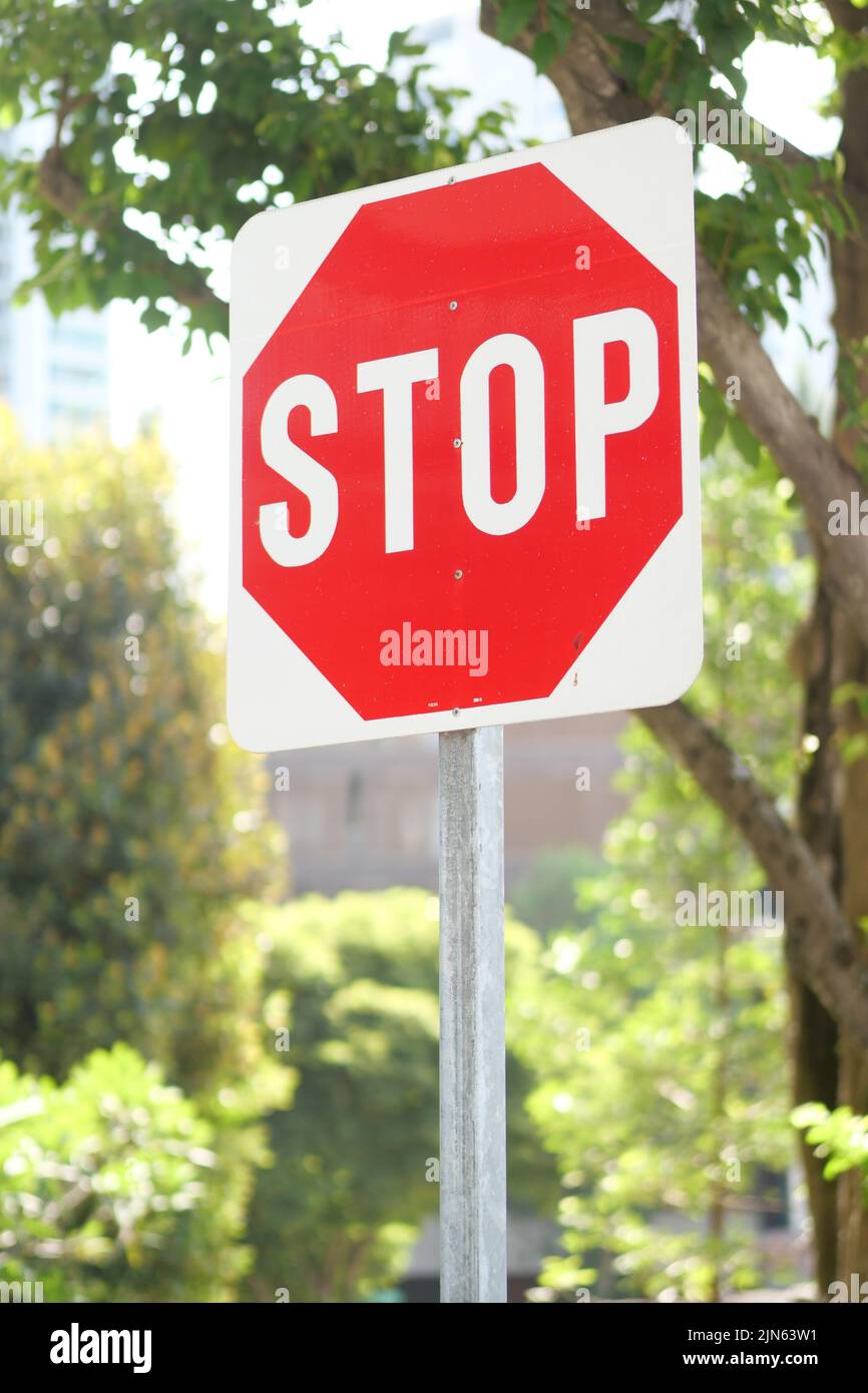 Stop sign in a empty road  Stock Photo