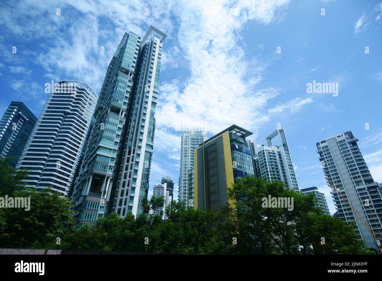 low angle view of singapore city buildings. Stock Photo