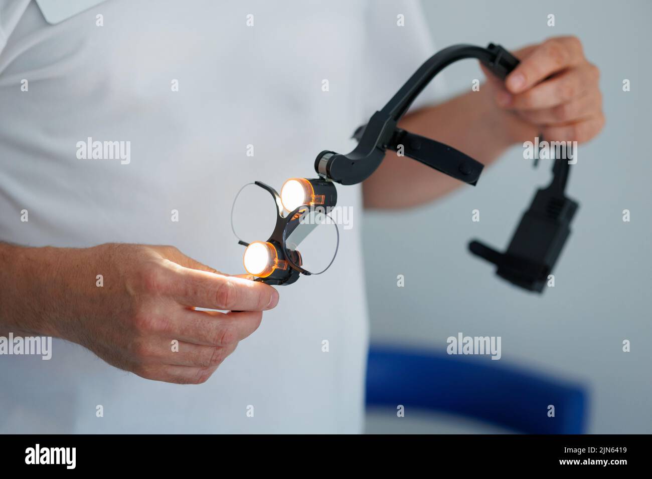 Dental binocular loupes in dentist hands Stock Photo Alamy