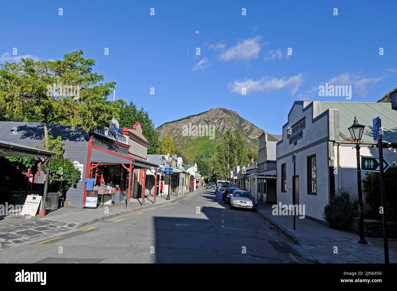 An old gold mining town, Arrowtown in Otago, New Zealand with its original wooden built buildings in Buckingham Street. It is a popular street with sho Stock Photo
