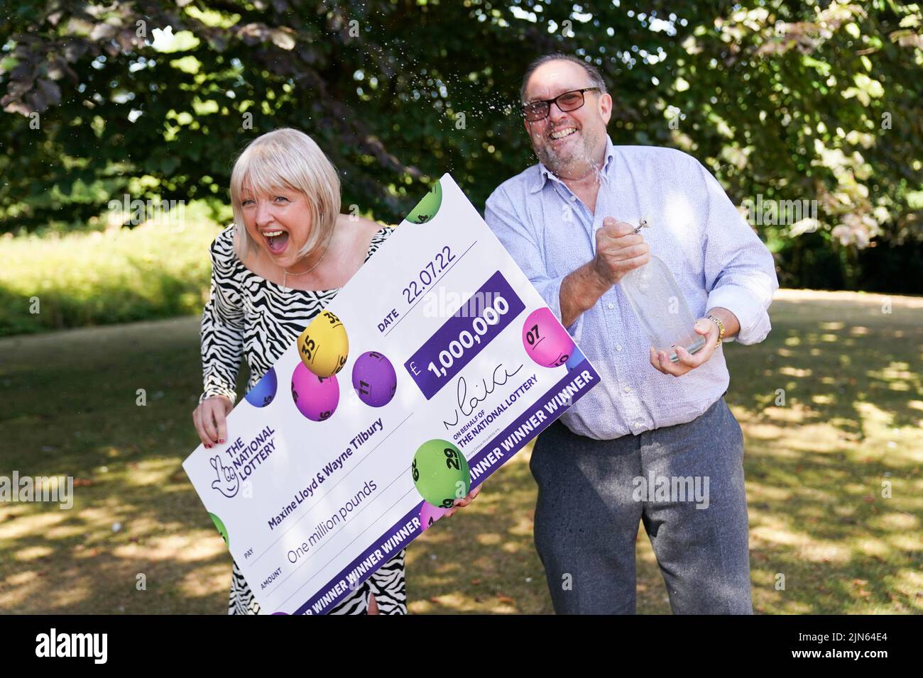 NHS worker Maxine Lloyd and her fiance Wayne Tilbury, from Kettering, celebrate her £1 million win on one of the National Lottery's instant win games at Barton Hall Hotel in Kettering, Northamptonshire, which became a double-celebration when she received the all-clear for breast cancer a few days later. Picture date: Tuesday August 9, 2022. Stock Photo