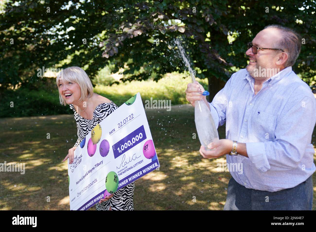 NHS worker Maxine Lloyd and her fiance Wayne Tilbury, from Kettering, celebrate her £1 million win on one of the National Lottery's instant win games at Barton Hall Hotel in Kettering, Northamptonshire, which became a double-celebration when she received the all-clear for breast cancer a few days later. Picture date: Tuesday August 9, 2022. Stock Photo