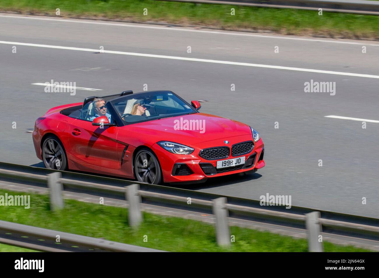 2019 BMW Z4 420i M Sport Auto Gran Coupe 1998cc Petrol 8 speed automatic roadster, travelling on the M6 motorway, UK Stock Photo