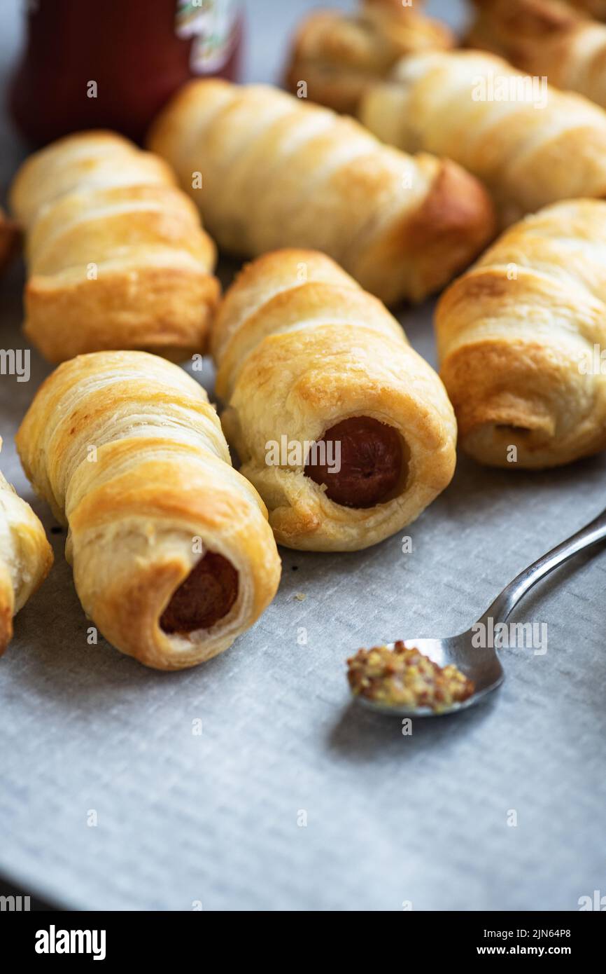 Pigs in a blanket mini rolls with sausages wrapped in a puff pastry