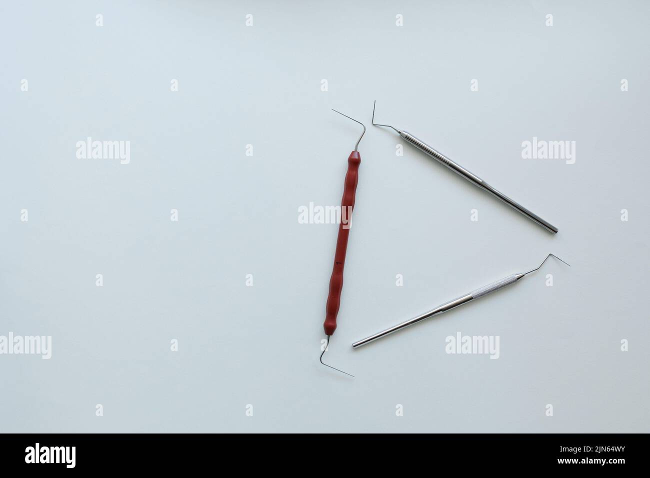 Instruments for periodontal examination. Dental probe on white