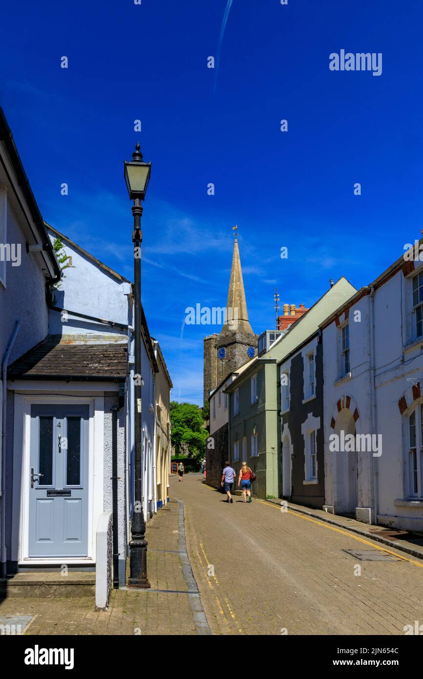 Looking along Cresswell Street towards St Mary's church in Tenby, Pembrokeshire, Wales, UK Stock Photo