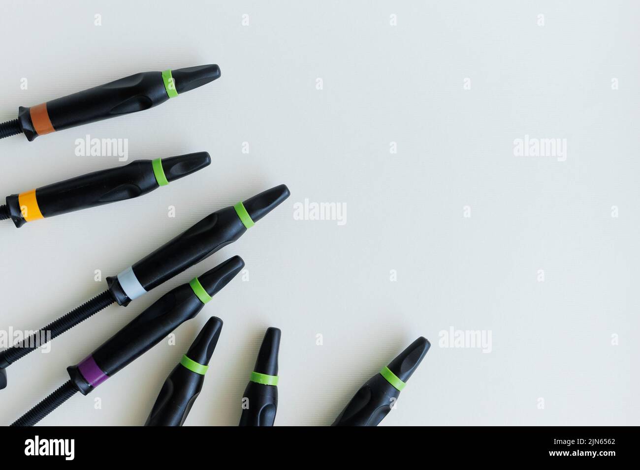 Dental composite filling materials on white background Stock Photo