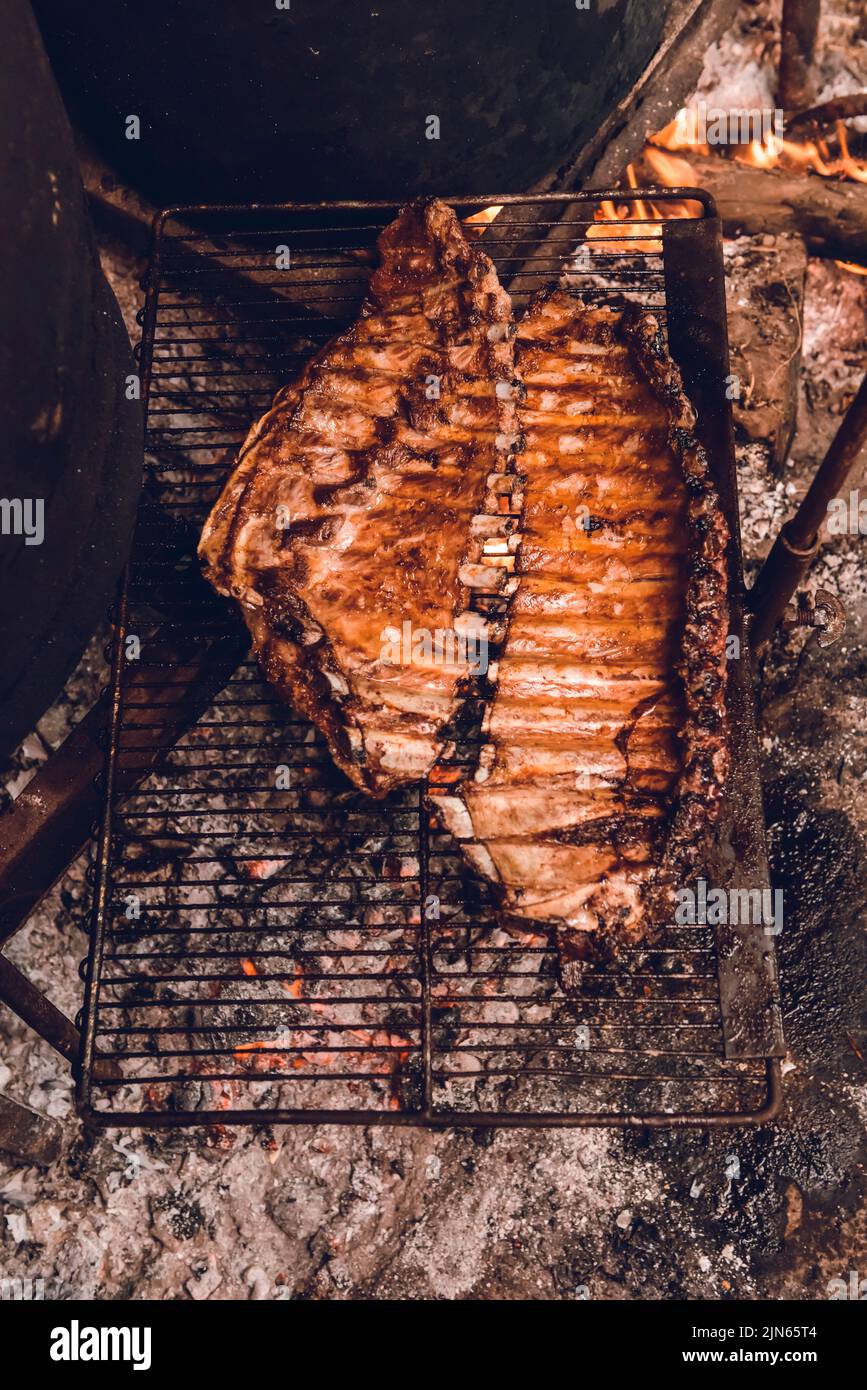 Roasted Crispy Ribs, traditional Argentinian barbecue Stock Photo - Alamy