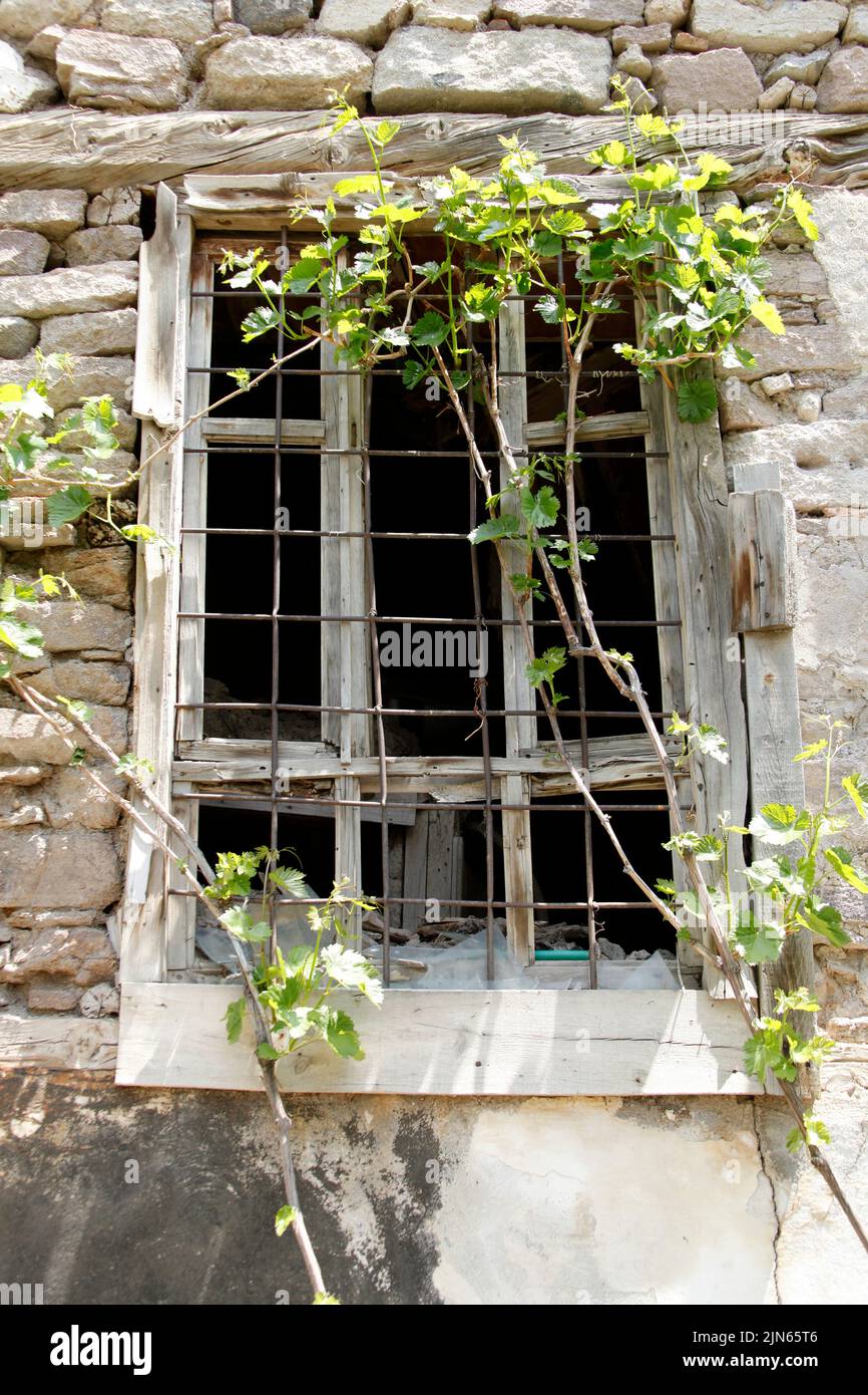 broken window of an old stone house Stock Photo - Alamy